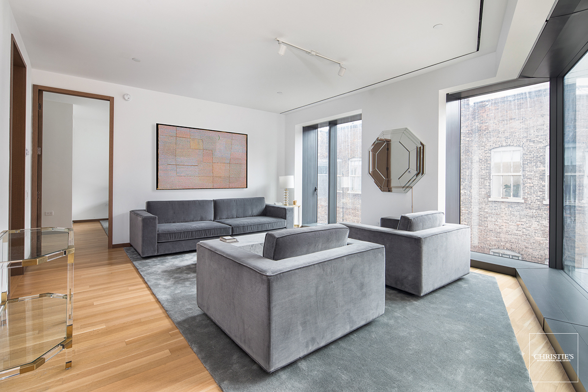 551 21ST ST W 4F New York, New York 551 WEST 21 DESIGNER CONDOMINIUM Introducing the perfect pied-a-terre and the first one-bedroom resale at the celebrated and record-breaking Foster + Partners 551 West 21st Street. Impeccably furnished, this gracious 1,064 square foot one-bedroom, 1.5 bathroom loft, with a large eat-in-kitchen is a sophisticated hideaway featuring a grand entry foyer with custom cove lighting, motorized privacy shades, custom finishes throughout and a private laundry room. The top of the line appliances includes a Subzero refrigerator, Foster + Partner's designed kitchen by Molteni with Miele oven and dishwasher, Gaggenau cooktop, Falmec extraction hood and Dornbracht fixtures. The en-suite master bathroom is luxurious with cove lighting, granite flooring, and Duravit water closet. 551 West 21st Street provides an exclusive and urbane setting ideally located on Manhattan's waterfront and on the premier block in one of the most vibrant and sought after neighborhoods in the world. The building is perfectly located on the best block of the West Chelsea Arts District, with top gallerists from Paula Cooper, Barbara Gladstone, Gagosian and David Zwirner all as neighbors; additional nearby attractions include the High Line Park, Avenues: The World School, countless restaurants and shopping, the High Line Hotel and soon NYC's first Six Senses Hotel. Exquisitely crafted by the master architects of Foster + Partners, 551 West 21st Street features a gated drive court surrounded by a 20-foot green wall, a dramatic 34-foot, double height lobby with custom designed chandelier and a prismatic glass wall allowing natural light to flood the space. Additional amenities include full-time doorman and concierge, porter and valet services, a state-of-the-art fitness center with a his and her spa and sauna, yoga room, residents' lounge, children's playroom, bike storage, a live-in super and a dedicated, separate service entrance. Additional parking is available for purchase, providing an immediate escape in and out of the City via the West Side Highway.