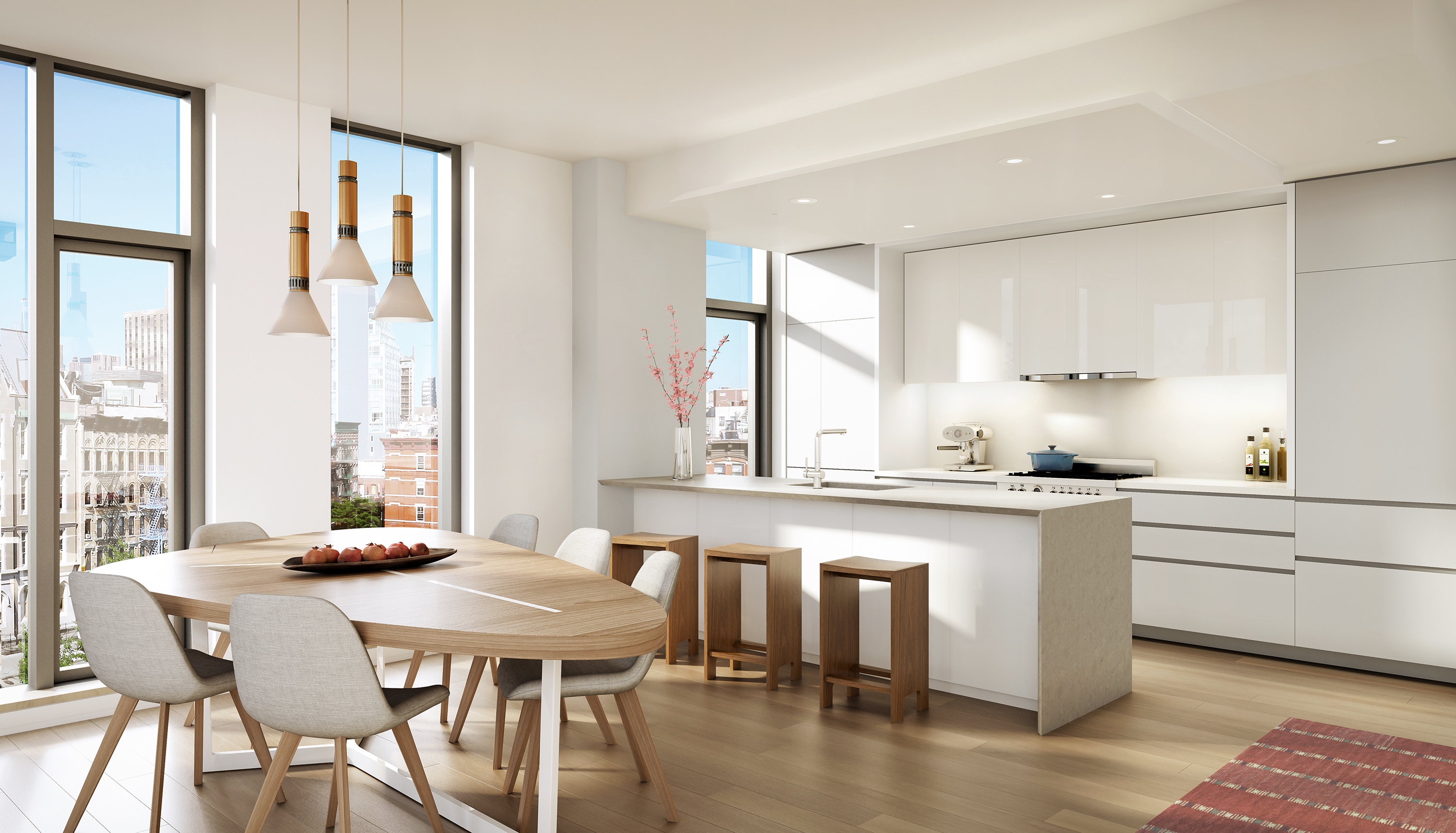 150 RIVINGTON ST 2C New York, New York Model Home On-Site. Showings by appointment. Distinctly Modern. On a prominent corner in the heart of the Lower East Side, 150 Rivington delivers forty- five thoughtfully crafted one to three bedroom residences designed by visionary architect Gluck +. The search for that well priced three bedroom two and a half bath in lower Manhattan ends here. 2C is that illustrious smart design with not one inch of wasted space. Facing west, with endless light and air, this residence offers versatility with a movable kitchen island and sliding secondary bedroom doors.
Sweeping expanses of glass, punctuated by carefully placed privacy panels maximize natural light and dynamic views. Custom wire-brushed oak flooring lends warmth to the interior. Italian-made translucent sliding doors by Rimadesio give residents a uniquely flexible living space. Modern kitchens feature Italian custom cabinetry, honed Caesarstone countertops and high-end appliances including Smeg range, speed oven, integrated Liebherr refrigerator and a separate wine refrigerator in select units. Honed Pelle Grigio marble cascades from ceiling to floor in the master bath and acts as a canvas for the floating Gluck + designed ash wood vanity with wall-mounted fixtures from Brooklyn's Watermark. Life at 150 Rivington is a natural extension of the building's setting in a neighborhood replete with creative energy and cultural cachet. A sophisticated lobby with a 24-hour attendant greets residents with warm wood accents and comfortable seating. Interiors are outfitted with smart home technology to allow for temperature control through mobile devices and management of lighting, shades, home audio and more through a single device. A dramatic 1,570 square foot landscaped rooftop terrace with an outdoor kitchen, fireplace and a spate sun deck for yoga. Additional amenities include a fitness center, bike storage and individual storage for purchase. The complete offering terms are in an offering plan available from Sponsor. File No. CD15-0391. Sponsor: 148 Rivington Street Development LLC, 600 Madison Avenue, Suite 300, New York, NY 10022. Equal Housing Opportunity.
