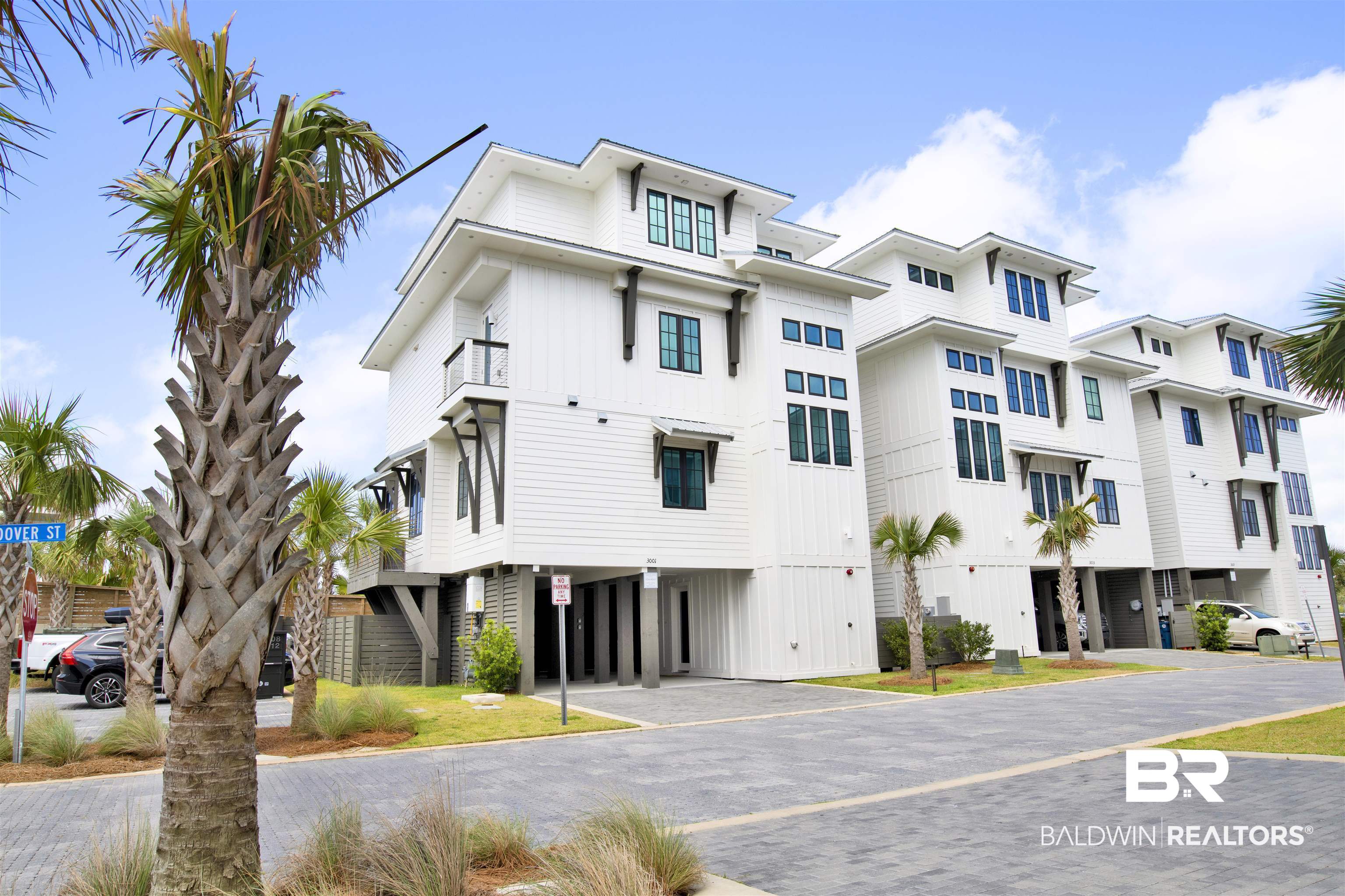 Refined Coastal Living tucked within the exclusive Bluffs community in Orange Beach, this beautifully designed 4-bedroom, 3.5-bath home offers 2,792 square feet of thoughtfully crafted living space just moments from the shoreline. Residents enjoy private dune walkovers to the Gulf, along with the convenience of being within walking distance to many of Orange Beach’s favorite restaurants, shops, and attractions.Built to Gold Fortified standards, the home pairs quality construction with timeless coastal design. The main living level features 10-foot ceilings, warm wood flooring, and an open, inviting layout that feels both elegant and comfortable.At the heart of the home is a well-appointed kitchen with Wolf and Sub-Zero appliances, custom cabinetry, a large island, and a spacious pantry, making it ideal for gathering with family and friends. The living area is anchored by a vented gas fireplace, while a wet bar with wine cooler and ice maker adds an extra touch for entertaining.The top-floor primary suite provides a private retreat, offering a peaceful space to unwind. Additional bedrooms comfortably accommodate family and guests, and the baths feature beautiful tilework and frameless glass showers.Outdoor living is just as inviting, with a private gunite pool, grilling area, and outdoor shower, perfect after a day spent at the beach. Other notable features include an elevator servicing all floors, a spacious laundry room, impact-resistant windows and doors, a metal roof, fiber optic internet capability, and dedicated parking for each bedroom.The Bluffs is known for its charming brick-paved streets, additional guest parking, and its close proximity to the beach, offering a rare blend of privacy and walkable coastal living. Buyer to verify all information during due diligence.