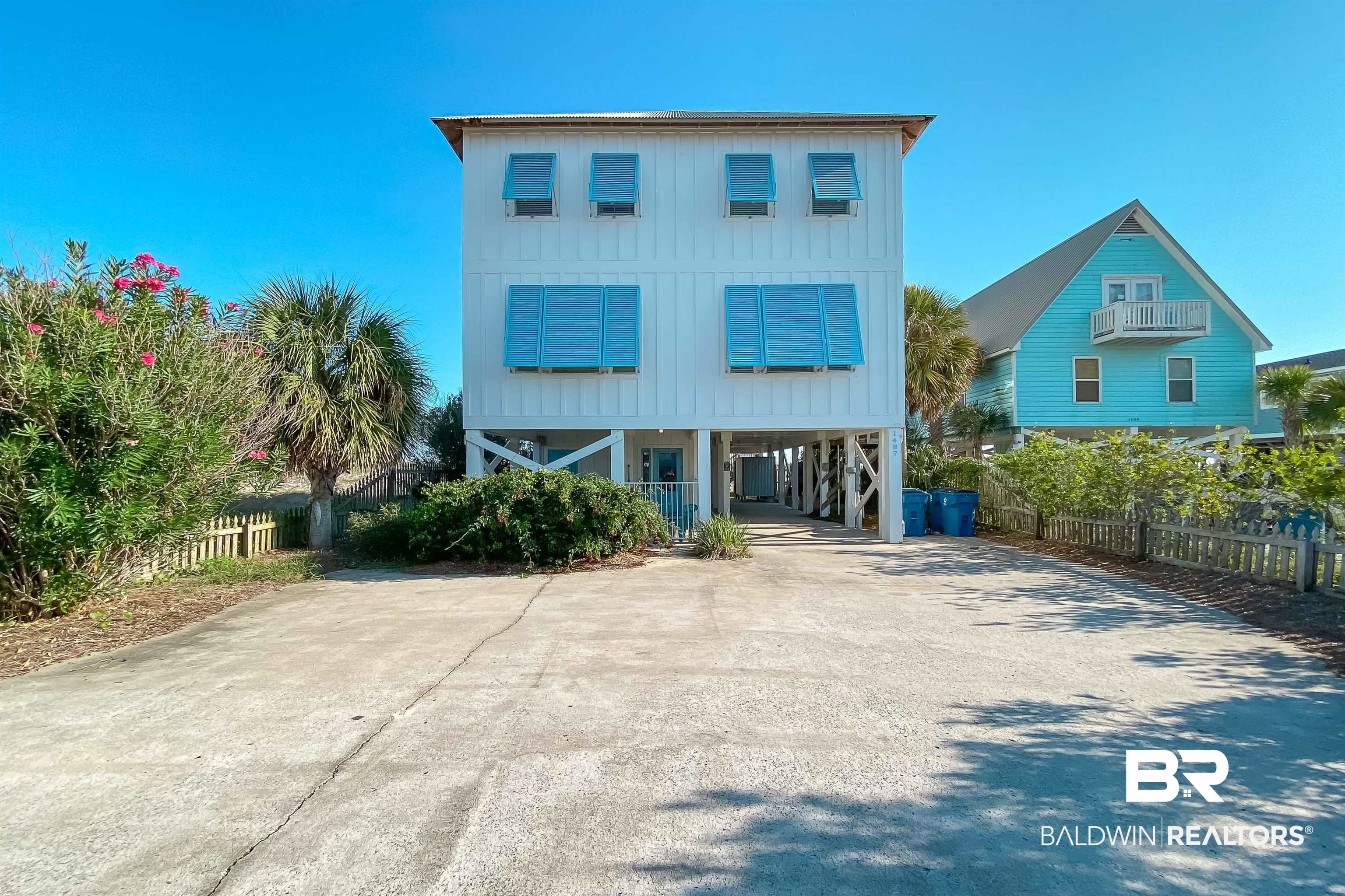 Welcome to Summer Lovin'! Experience true beachfront living at this 6 bedroom, 6 bathroom home in Gulf Shores. This property offers everything you need for the perfect coastal getaway or investment opportunity, including space, comfort, and convenience. The open living, dining, and kitchen area showcases beautiful Gulf views and provides plenty of space for gathering. Two bedrooms are located on the main floor, while four additional bedrooms are upstairs, each with its own private bathroom. The upstairs primary suite features a private balcony overlooking the beach and a cozy sitting area with a trundle bed for extra guests. Enjoy the private elevator for easy access to every level, a covered and heated splash pool and a large hot/cold outdoor shower downstairs, a spacious outdoor deck perfect for relaxing and outdoor dining, and a brand new private walkover to the beach. An established high producing rental income makes this home a rental machine! With room to sleep up to 18, this beachfront home truly has it all. New HVAC, water heater, pool equipment, and under counter fridge all recently added.  Buyer to verify all information during due diligence.