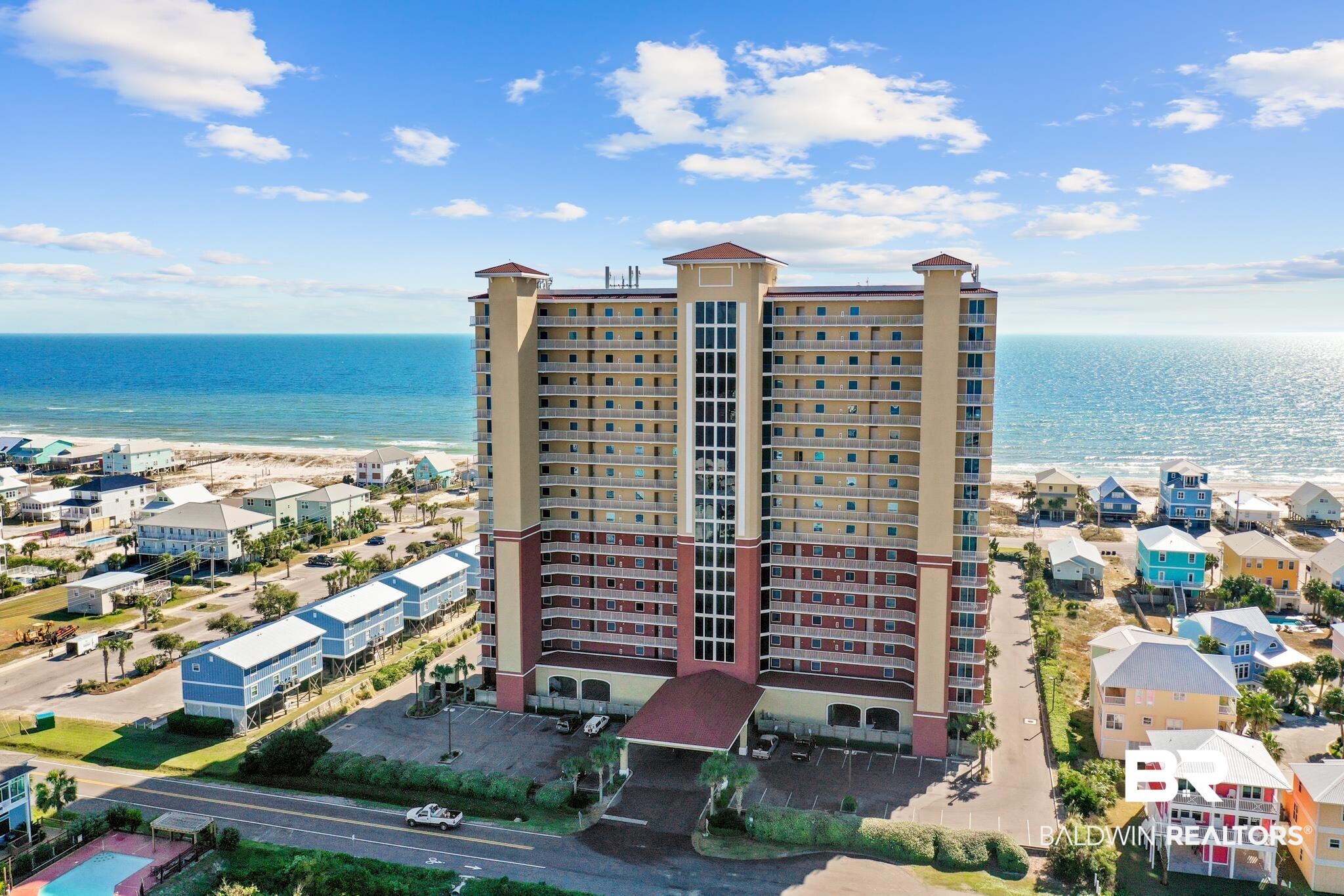 Welcome to Sanibel in Gulf Shores, where beach days are easy and everything you love about the coast is nearby. Located directly across the street from the Gulf beaches and just minutes from local dining, shopping, and family fun, this complex keeps you close to it all. Amenities include an outdoor pool, kiddie pool, fitness room, sauna, BBQ area, and it’s just a short walk to the pier on Little Lagoon for fishing or catching the sunset. With 3 bedrooms, 3 bathrooms, and 1,536 square feet, this fully furnished condo is currently a short-term rental with projected income between $25,000 and $43,000 annually. Recent updates help make this unit truly move-in and rental ready, including all kitchen appliances replaced in 2021, as well as new carpet and fresh interior paint, a new water heater in 2023, and a new washer and dryer in 2024. The bathrooms have been updated with upgraded faucets, toilets, and shower heads, and the thermostat has also been replaced for added efficiency. Additional furnishings and balcony furniture have been refreshed in recent years, giving the condo an updated, well-maintained feel throughout. Unit 301 is a west-side corner unit overlooking the pool and offering beautiful sunrise and sunset views. The living area features floor-to-ceiling windows and a balcony that spans the entire Gulf side of the unit, showcasing those classic coastal views. The kitchen includes granite countertops, tile flooring, stainless steel appliances, bar seating, and an adjacent dining area. The primary bedroom has its own private balcony with views of Little Lagoon and an ensuite bath with a double vanity, granite countertops, and a tub/shower combo. One guest bedroom includes its own ensuite bathroom, while the third bedroom has shared access to a full bath. A utility closet with a washer and dryer completes the unit. Whether you’re looking for a beach retreat, an investment property, or a little bit of both, this well-kept corner unit checks all the boxes. Buyer