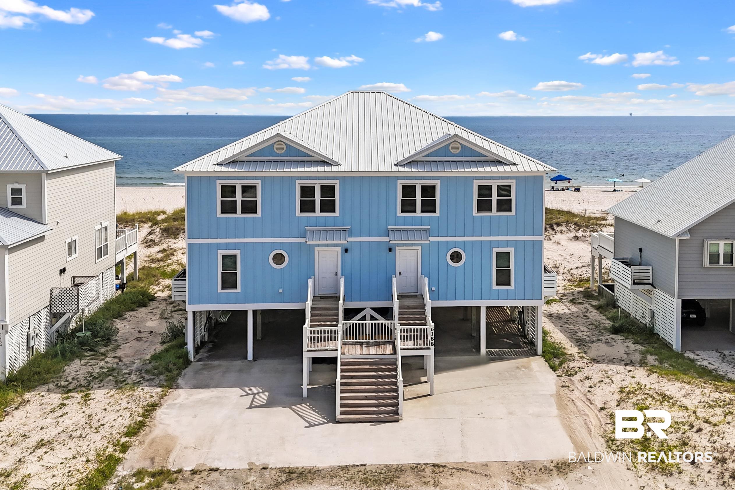 Wake up to the sound of the Gulf and enjoy the beach just steps from your back deck. This Gulf front duplex in Morgantown sits on 75 feet of shoreline and offers the best of both worlds—plenty of space for family and friends plus the option to generate strong rental income. Each side is 2,052 square feet with 4 bedrooms and 3 bathrooms, giving you a total of 8 bedrooms, 6 baths, and 4,104 square feet under one roof.The home has been well maintained with updates including new Hardie board siding, windows and a 4 year old metal roof, so the heavy lifting has already been done. Both sides are currently used as vacation rentals and have a solid history, making it easy to step right in if you choose. If rental income isn’t the priority, it also works perfectly as a multi-generation beach retreat, giving everyone their own space while still being together.Morgantown is a community designed for people who love the beach without the hustle of crowded tourist areas. You’ll find two pools, tennis courts, and a friendly neighborhood feel. From the house, it’s a quick drive to historic Fort Morgan or The Beach Club and Jesse's on the Bay for dining and amenities.This isn’t just a beach house—it’s a place for long mornings on a quiet stretch of sand, afternoons by the pool, and evenings spent watching the sun drop into the Gulf with the people who matter most.This duplex has solid rental numbers and is turn key, fully furnished, and rental ready! The monthly HOA fee also includes internet and cable for both units.  Buyer to verify all information during due diligence.