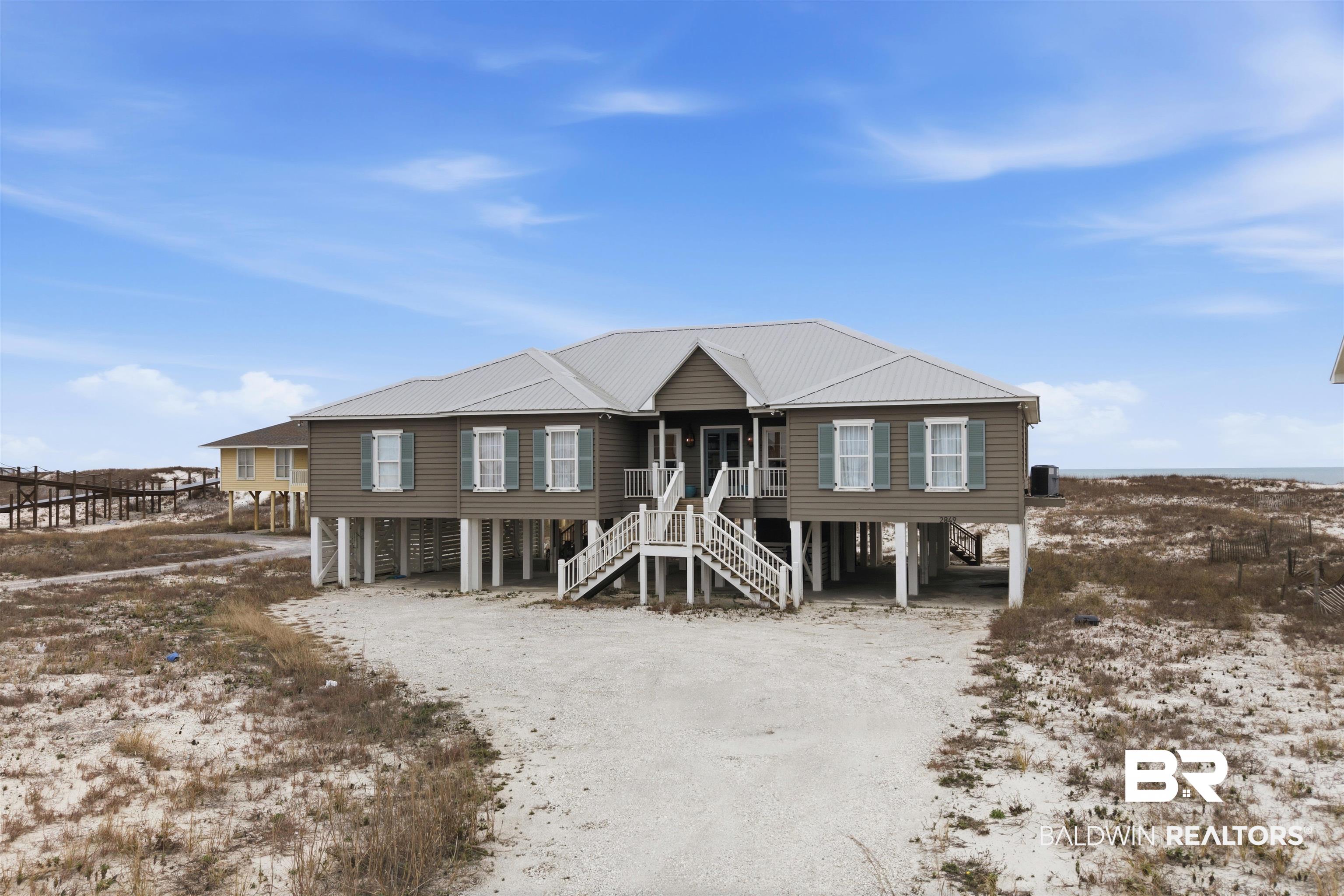 Rare Gulf-Front Opportunity – West Beach, Gulf ShoresVery rare non-rental, one-level Gulf-front home situated on a private 100-foot lot on sought-after West Beach in Gulf Shores. This beautifully updated 5-bedroom, 4-bath residence offers the perfect blend of comfort, privacy, and investment potential.Completely renovated in 2021, the home features new interior and exterior paint, updated plumbing and electrical, new flooring throughout, new HVAC, and new tankless water heaters. Electronic interior blinds provide added convenience and effortless light control throughout the home. The spacious primary suite includes heated floors for an extra touch of luxury. A stunning electric fireplace with limestone mantle creates a warm focal point in the main living area. Pool plans will convey with home.All living space is conveniently on one level with covered parking below. Additional upgrades include a new metal roof (2020), whole-home stereo system with interior and exterior speakers (2021), and a security/alarm system (2021).With 100 feet of direct Gulf frontage and strong rental potential, this property offers flexibility as a primary residence, second home, or income-producing investment.A true West Beach gem — Gulf-front properties like this rarely come available. Buyer to verify all information during due diligence.
