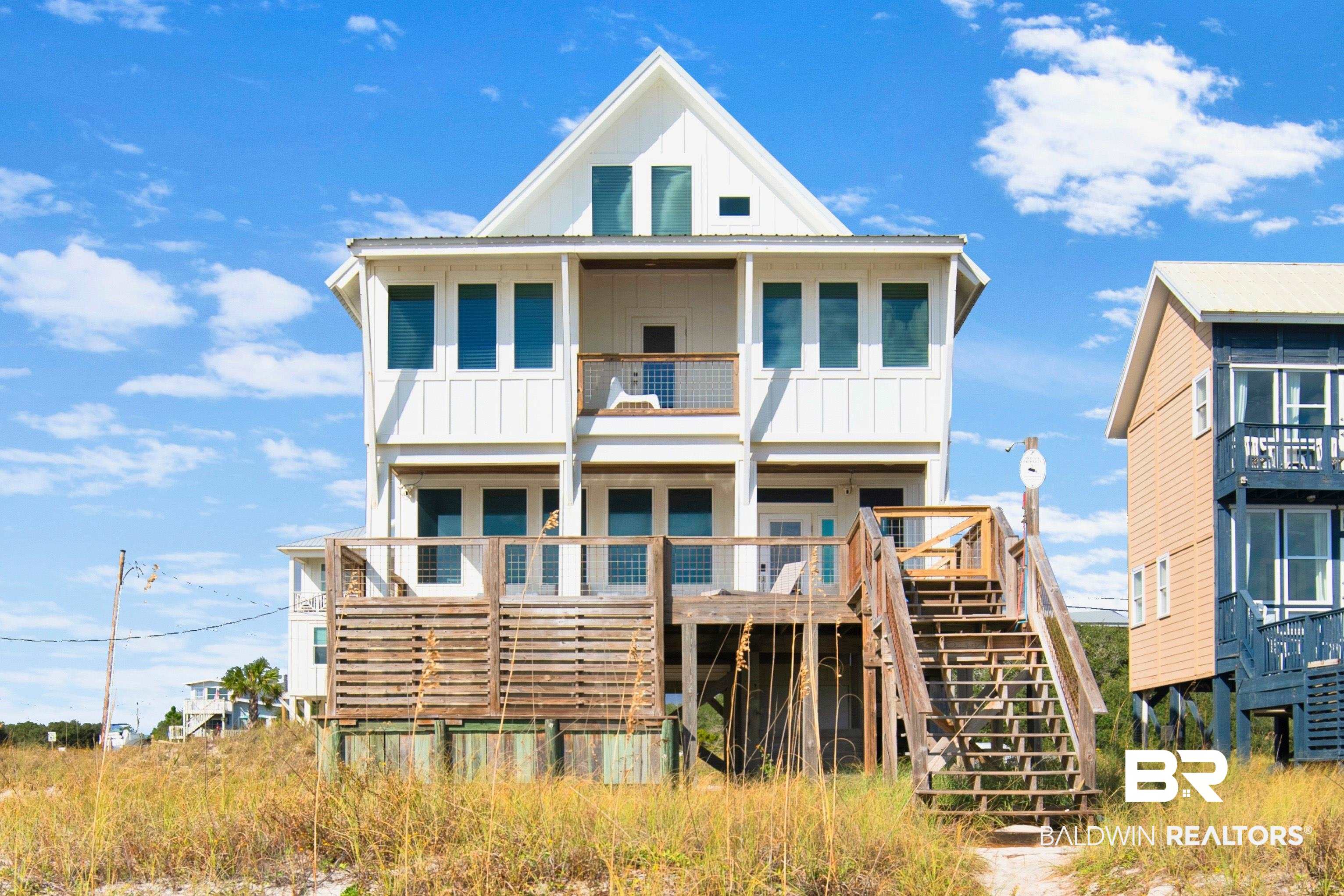 TURN KEY REVENUE RETREAT - The Salty Pelican, a coastal sanctuary where investment meets indulgence. This Private Gulf Front escape that has an incredible 3 yr avg revenue income of $240,000. Already on the books for 2026 -$110k, making it both a consistent income producer and a haven for those who crave salt air and simplicity. This stunning coastal retreat where every inch has been rebuilt with intention, style, and comfort. Brought down to the studs & rebuilt in 2020-2021, this home feels brand new yet radiates the warmth and ease of true coastal living. This home even has its own private beach! Step inside and experience a seamless blend of modern craftsmanship and relaxed sophistication; from the fresh Hardie siding and new metal roof to the light filled interiors anchored by LVT flooring. Every surface was touched; new doors, hurricane rated turtle glass windows, complete electrical and plumbing upgrades, and two efficient heat pump water heaters. The chef’s kitchen shines with new cabinetry, sleek quartz countertops, a deep stainless sink, high-end appliances, a beverage refrigerator, under counter ice maker, and full-size washer and dryer. The bathrooms evoke spa level serenity with tiled walk-in showers, LED mirrors, and all new fixtures and vanities. Enjoy added comfort with dual HVAC systems, a whole home dehumidifier, two Reme Halo air purification systems, and insulation that keeps the home energy efficient year-round. Outside, the upgrades continue with new paint, deck railing with hog pen detail, and a Tesla charger ready for your next adventure. Recent additions make this home even more turnkey: all new window blinds, 4 exterior Ring security cameras, and Starlink internet for lightning-fast connectivity. Every room furnished with designer curated pieces from the down filled slipcovered sofa to the dining and bedroom furniture creating a true coastal Paradise. All you need to do is enjoy & let it pay for itself.  Buyer to verify all information Buyer