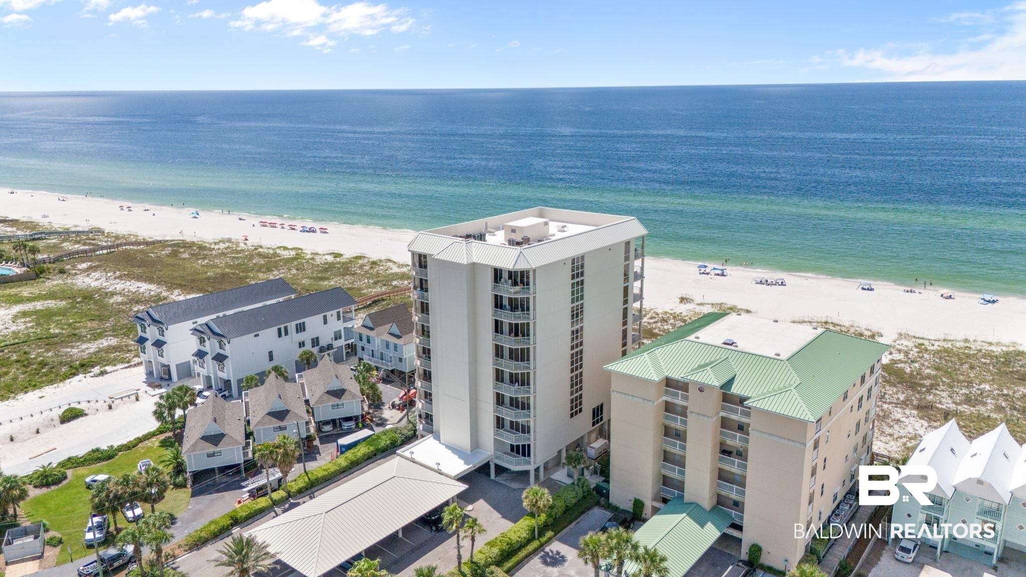 BREATHTAKING 5TH FLOOR RESIDENCE WITH AWE-INSPIRING EAST ISLAND VIEWS! WELCOME TO SEA WATCH, WHERE OWNERS AND GUESTS EXPERIENCE ONE OF PERDIDO KEY'S MOST SECLUDED AND UNCROWDED BEACHES. EACH RESIDENCE FEATURES PRIVATE ELEVATOR ENTRY WITH A CONVENIENT SHOWER TO RINSE OFF SAND, TWO ASSIGNED PARKING SPACES (ONE COVERED AND ONE UNCOVERED), AND A MINIMUM ONE-YEAR RENTAL POLICY FOR ADDED PRIVACY. This impressive 2,741 sq. ft. 4-bedroom/4.5-bathroom layout is among the finest on the island, featuring a Gulf-front Primary Suite and private hallways leading to each guest bedroom, with 3 of the 4 bedrooms having private access to balconies ensuring everyone enjoys both privacy and amazing water views. The open-concept living/dining area boasts stunning gulf views with floor-to-ceiling windows, complete with updated wet bar which is perfect for entertaining. Storage is abundant in this beach home, with walk-in closets in every bedroom and additional hallway storage, including a large closet for an extra refrigerator and added shelving. The spacious primary bathroom offers a double vanity, soaking tub, separate shower, and ample storage, including added linen cabinetry. Tile flooring throughout the main living area, complemented by NEW engineered wood flooring in the bedrooms. Recent updates include a new HVAC system (2020), water heaters (2019), custom draperies (2023) and a dehumidifier system (2024). Sea Watch owners enjoy wonderful amenities including Gulf-front outdoor pool (with covered area to get out of the sun), fitness center, and billiards room. THIS IS THE LUXURY BEACH HOME YOU HAVE BEEN DREAMING OF! Buyer to verify all information during due diligence.