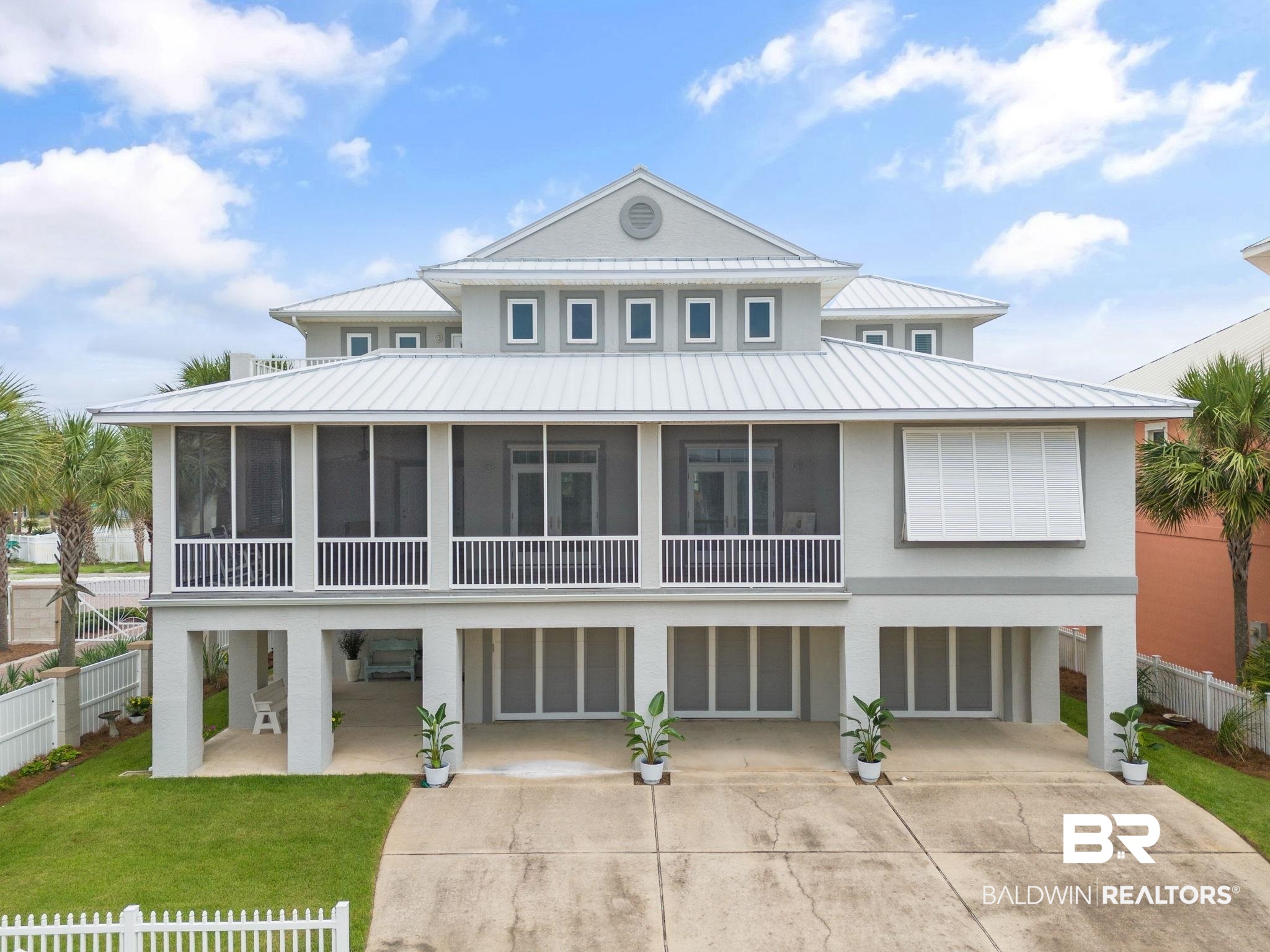 Sun, sand & Gulf breezes. Paradise awaits at this 5-bedroom coastal beach home in the exclusive, Gulf-front community of Parasol with 900' Gulf frontage. This bright & cheery custom-built residence with ELEVATOR boasts over 3,000sf of space under roof & features top-notch construction with numerous upgrades including NEW HVAC. You'll be impressed by the dry lock aluminum decking on the upper balcony, porcelain tile on the 2nd-floor patio, & upgraded flooring in the 3rd-floor Jack & Jill bathroom & 2nd-floor bath. The exterior has been refreshed with elastomeric stucco paint, resurfaced columns, & updated attic insulation at 19.75" R60 works to keep the home cool & comfortable. The residence also includes an upgraded aluminum rails, screens, & fan on the 2nd-floor patio, exterior nautical lights, & a  2" standing seam double lock aluminum roof with 12" panels & matching fascia trim installed in 2021. The exterior is truly top-notch & decked with hurricane shutters & hurricane-rated windows. Inside this beach home is a welcoming layout & ample space to relax & unwind after a long day under the sun. The large kitchen, perfect for entertainment, is adorned with granite countertops, an island bar, & stainless-steel appliance. Other notable features include a beautiful color palette of interior paint, tiled living area & storage room off the garage & downstairs guest/kids' suite. The primary bedroom is generously sized, with a primary bathroom that includes split vanities & walk-in closet. The 3rd-floor balcony provides a breathtaking view of the Gulf. Relax on the over 800sf of porch area. The greatest convenience is the elevator servicing all three floors! Enjoy your days at the beach or out on the open waters of the Gulf & store your water equipment in the expansive 3-car garage.  Parasol is a gated, rent-restricted community offering a community pool & over 900 feet of gulf frontage, easy access to the National Seashore, & captures all the beauty of PARADISE! Buyer to