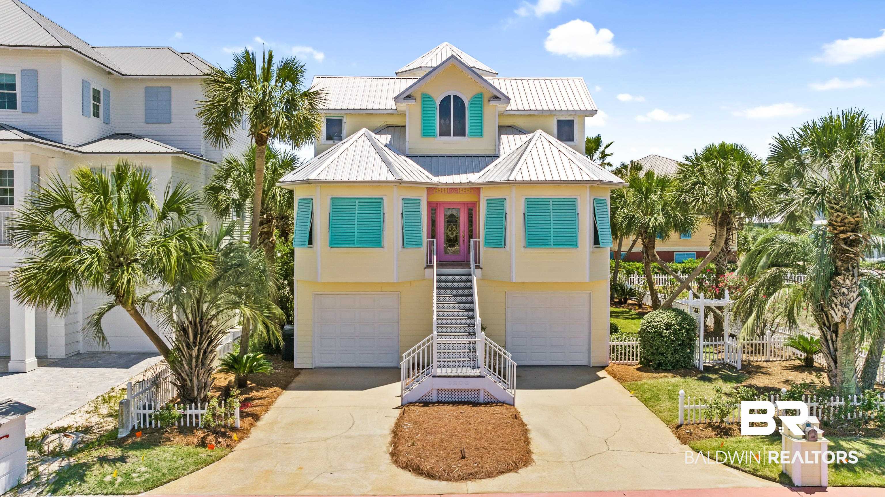 RARE FIND in Perdido Key’s Only Gated Beachfront Community – Parasol! This fully remodeled and furnished 3BR/3.5BA + bunk area home is located just steps from 900+ feet of private white-sand beach and within walking distance to miles of National Seashore. Recent upgrades include a new roof, flooring, cabinetry, appliances, HVAC, bathrooms, fixtures, and paint! The open-concept main living area is ideal for entertaining. The main-level primary suite features a large walk-in tiled shower and freestanding soaking tub. The updated kitchen includes granite countertops, stainless steel appliances, and a picture window overlooking the backyard oasis. Enjoy screened porches, custom stained-glass windows, and elevator access to all levels. The beautifully landscaped backyard offers mature palms, an arbor, hot tub, and private gate to the community pool and beach walkover. Lower level includes a bunk area, two 1+ car garages, workshop, outdoor shower, and stainless fish-cleaning station. The upper level features two large guest bedrooms with en-suite baths and walk-in closets. The rooftop deck offers stunning Gulf views. Low HOA dues, private beach access, gated entry, and golf cart-friendly community. Don't miss this turnkey coastal gem in the heart of Perdido Key! Buyer to verify all information during due diligence.