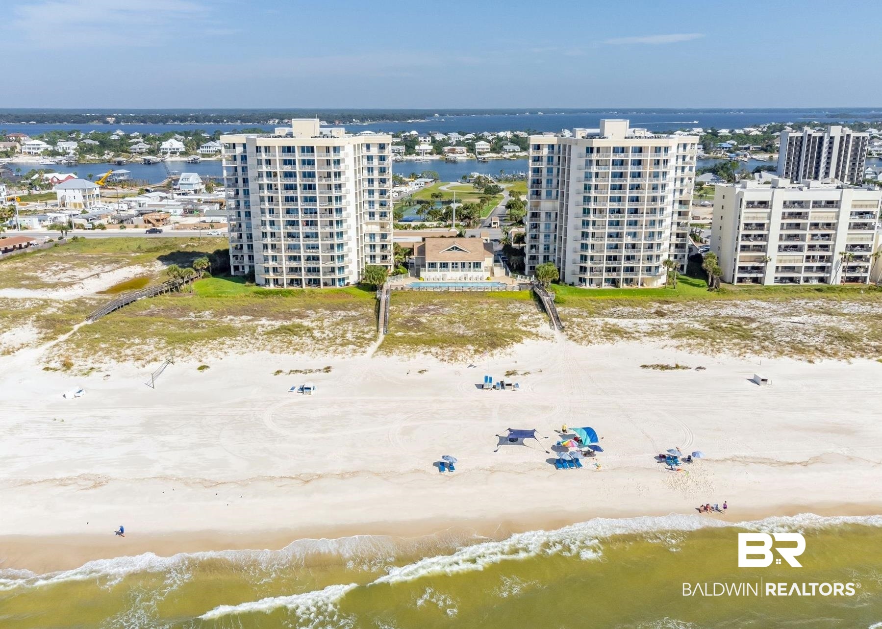 ENJOY THE BEST OF BOTH WORLDS IN THIS 3 BEDROOM/3 BATHROOM CORNER RESIDENCE FEATURING AN EXPANSIVE WRAP-AROUND BALCONY! ONLY 98 FORTUNATE OWNERS AT BEACH & YACHT CLUB HAVE ACCESS TO 450 FEET OF PRISTINE, WHITE SAND BEACHES AND DEEP-WATER BOATING FACILITIES JUST ACROSS THE STREET! This remarkable residence includes designated covered parking with an adjacent storage closet for owners, as well as an additional storage space outside the entrance. Unlike conventional layouts, this residence showcases distinctive angles and charm, enhanced by panoramic views from nearly every room through floor-to-ceiling glass windows equipped with REMOTE-CONTROLLED SHADES! Boasting elegant marble tile flooring in the living area, luxurious wool carpet in the bedrooms, a wet bar, high-end appliances, and exquisite fixtures throughout. The Primary Suite offers generous closet space, a spacious primary bathroom with a separate shower and jetted tub, and access to the expansive Gulf-front balcony with breathtaking sunset views. Beach & Yacht Club provides an array of amenities such as a large heated lap pool overlooking the Gulf, a newly designed owners' lounge, a fitness center, grilling areas, 2 illuminated Omni tennis courts, 49 boat slips with power and water, and a community boat launch. Notably, Beach & Yacht Club offers the largest number of first-come, first-served boat slips for a condominium on the island! Enjoy uncrowded beaches as rental occupancy at Beach & Yacht Club is restricted to 20% of ownership, with on-site rental services and management. Your Paradise Awaits!