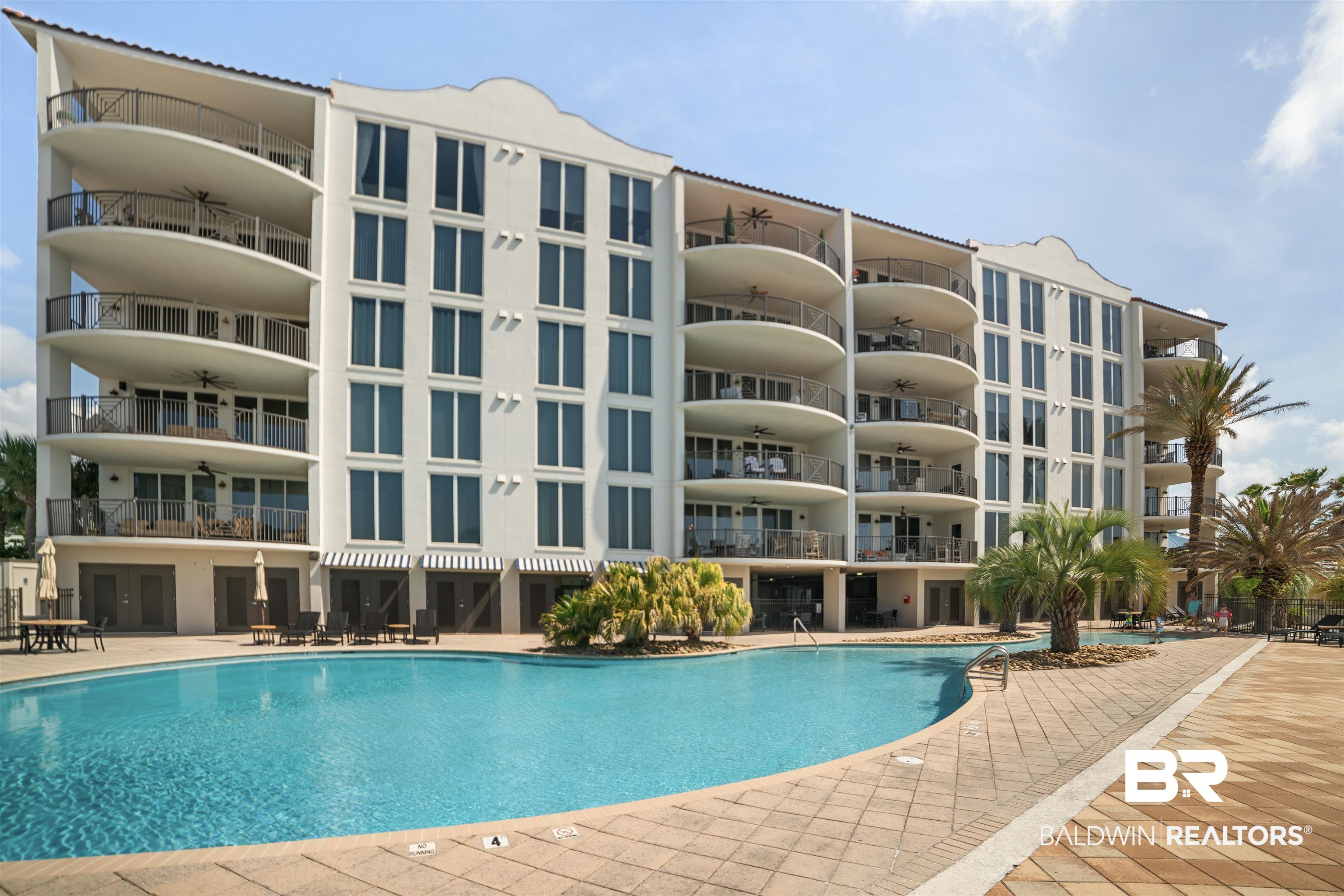 Welcome to the Yacht Club in Orange Beach — an exclusive, gated community nestled directly on the shores of Terry Cove. This stunning 4-bedroom, 4.5-bath, southeast corner condo offers over 3,200 sq. ft. of completely remodeled luxury with panoramic views of Terry Cove, The Pass, Bird Island, and Robinson Island. Inside, you'll find two primary suites with balconies, a beautifully redesigned kitchen, updated appliances including Eurocave wine storage, an ice machine, custom window treatments, and two indulgent soaker tubs. It includes a deeded  42 X 24 boat slip which currently has a 24’  with boat and jet ski lift, a private deeded cabana, two storage units, and the most coveted covered parking space in the complex. The Yacht Club is a low-density development with only 20 units, ensuring privacy and tranquility. Resort-style amenities include a private marina, pool with hot tub, fitness center, private beach with fire pits, grilling area, kayak storage, and ample guest parking. Don't miss this opportunity to own a piece of coastal paradise in one of Orange Beach's most exclusive communities. Buyer to verify all information during due diligence.