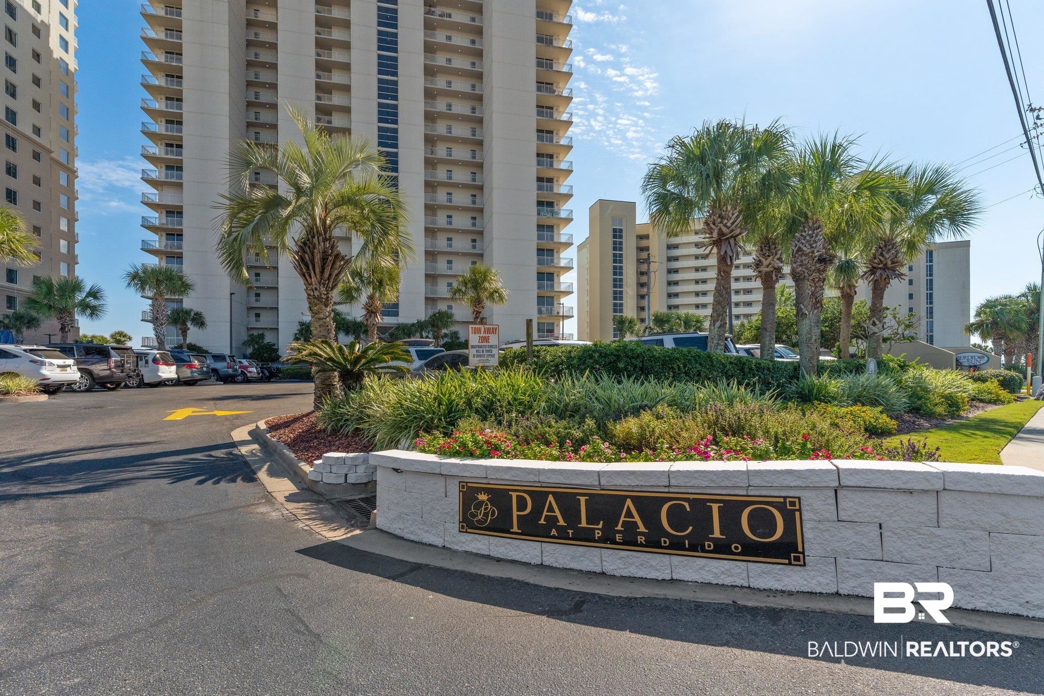 Paradise found! Soaring from the 18th floor, this rare 3-bedroom, 3-bath corner unit in the highly sought-after Palacio at Perdido Key offers breathtaking views of the Gulf that greet you the moment you step inside. Wrapped in natural light from floor-to-ceiling windows, the open layout is accentuated by high stretching ceilings and a serene coastal palette that perfectly complements the endless turquoise waterscape beyond. The expansive, L-shaped wraparound balcony invites you to unwind as Gulf breezes whisper through—perfect for morning coffee, quiet reading, or simply taking in the beauty of the sunrise & sunset skies. The spacious kitchen is a chef’s dream with granite countertops, stainless steel appliances, a large island & charming breakfast nook. A built-in wet bar with custom shelving adds a touch of elegance for entertaining. Retreat to the Gulf-front primary suite, your private sanctuary with balcony access, miles of shoreline views & a luxurious ensuite bath featuring a jetted tub, walk-in shower & dual vanities. Two additional guest suites provide comfort & privacy—one with its own north-facing balcony offering tranquil Intracoastal views. Stylish LVP flooring, high ceilings, tile accents & ample storage, including a full-size laundry area, elevate everyday living. Built for comfort & peace of mind, the unit includes a 2018 HVAC with service contract. Palacio's resort-style amenities include a Gulf-front pool, heated lap pool, tennis courts, fitness center, community room & under-building parking. Secure, keypad building access ensures your privacy. Whether it’s your personal beach escape or a relaxing second home, this condo offers the best of coastal living—elevated, easy & unforgettable. Buyer to verify all information during due diligence.
