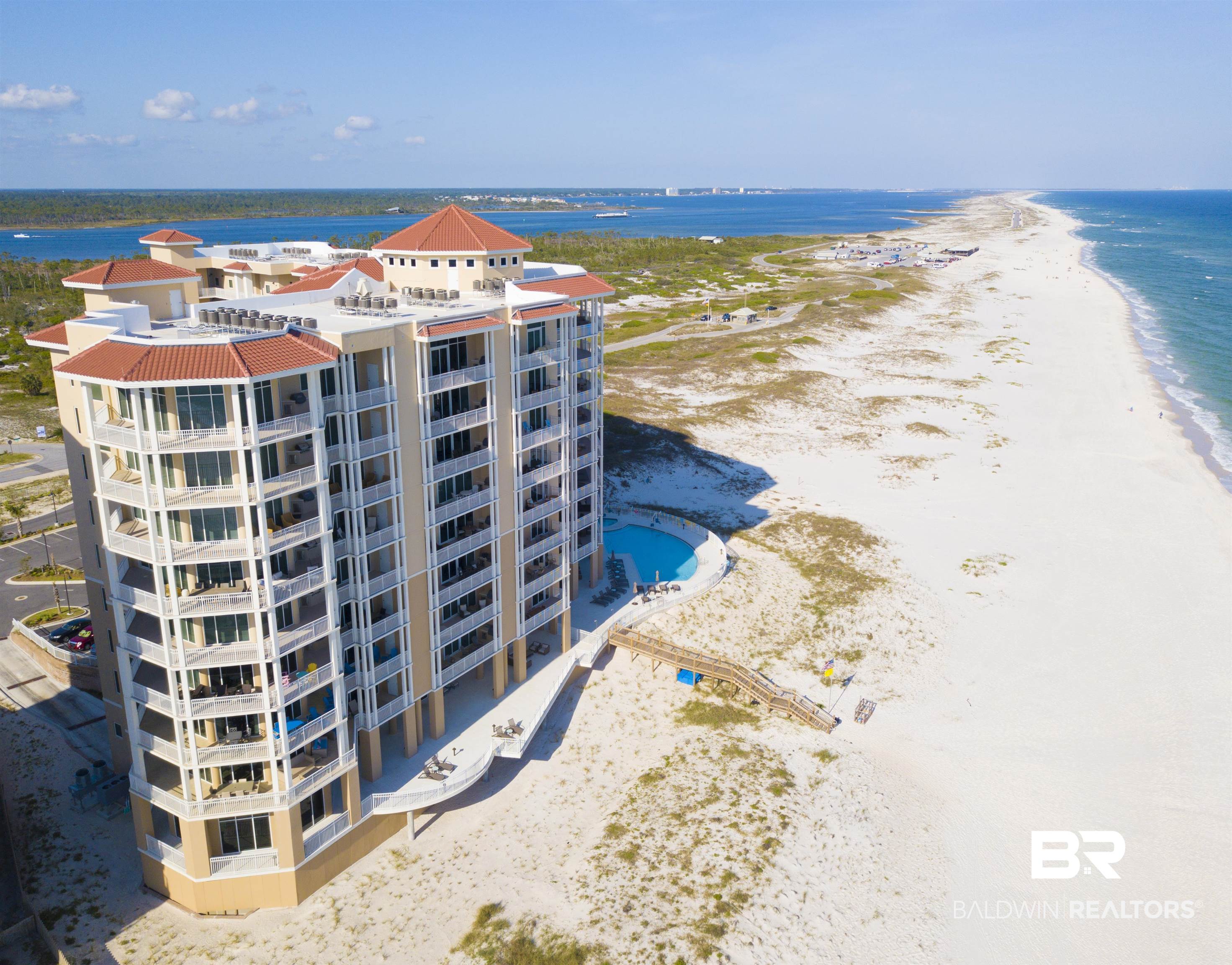 SPECTACULAR 9TH FLOOR PENTHOUSE RESIDENCE WITH BREATHTAKING GULF VIEWS OFFERING UNPARALLELED LUXURY AT PERDIDO KEY’S MOST SOUGHT-AFTER BEACHFRONT ADDRESS!  VISTA DEL MAR SHOWCASES PREMIUM RESIDENCES, SERENE BEACHES, AND STUNNING INTERIOR FINISHES TO APPEAL TO THE MOST DISCERNING BUYER. This expansive 3BR/3.5BA FURNISHED residence comes with assigned garage parking and boasts an innovative floor plan with striking floor-to-ceiling glass, large balcony with a gas grill for outdoor entertaining, and stunning gulf front vistas. The interior showcases sophisticated appointments including 12' ceilings, solid core doors, premium porcelain tile and impact-resistant glass windows. The fabulous kitchen is equipped with white quartz countertops, premium cabinetry, a Chef’s kitchen with Wolf® range and chimney hood, Sub-Zero® refrigerator, and a wet bar with a wine refrigerator. Luxurious bathrooms include frameless, thick glass shower doors and spacious walk-in closets. Enjoy a secure, gated community entrance, designated garage parking, THREE owner storage closets- climate-controlled owner storage at the amenity level, garage level storage at parking space, and additional storage on the balcony. The grand lobby entrance offers various seating areas, custom artwork, and awe-inspiring views. High-speed elevators lead to climate-controlled lobbies. Indulge in the lavish outdoor pool area with a vast beachfront deck, hot tub, and covered outdoor seating. Experience the heated indoor pool with stunning water views. The owner’s health club provides a fully-equipped fitness room, yoga studio, and massage treatment rooms. Residents can unwind in the club room with fireplace, bar, pool tables, and TVs. Surround yourself with lush landscaping. Adjacent to over 5 miles of the pristine Gulf Islands National Seashore offering nature trails, bike paths, and unspoiled beaches for your enjoyment. WELCOME HOME TO LUXURY BEACHFRONT LIVING AT ITS FINEST! Buyer to verify all information during d