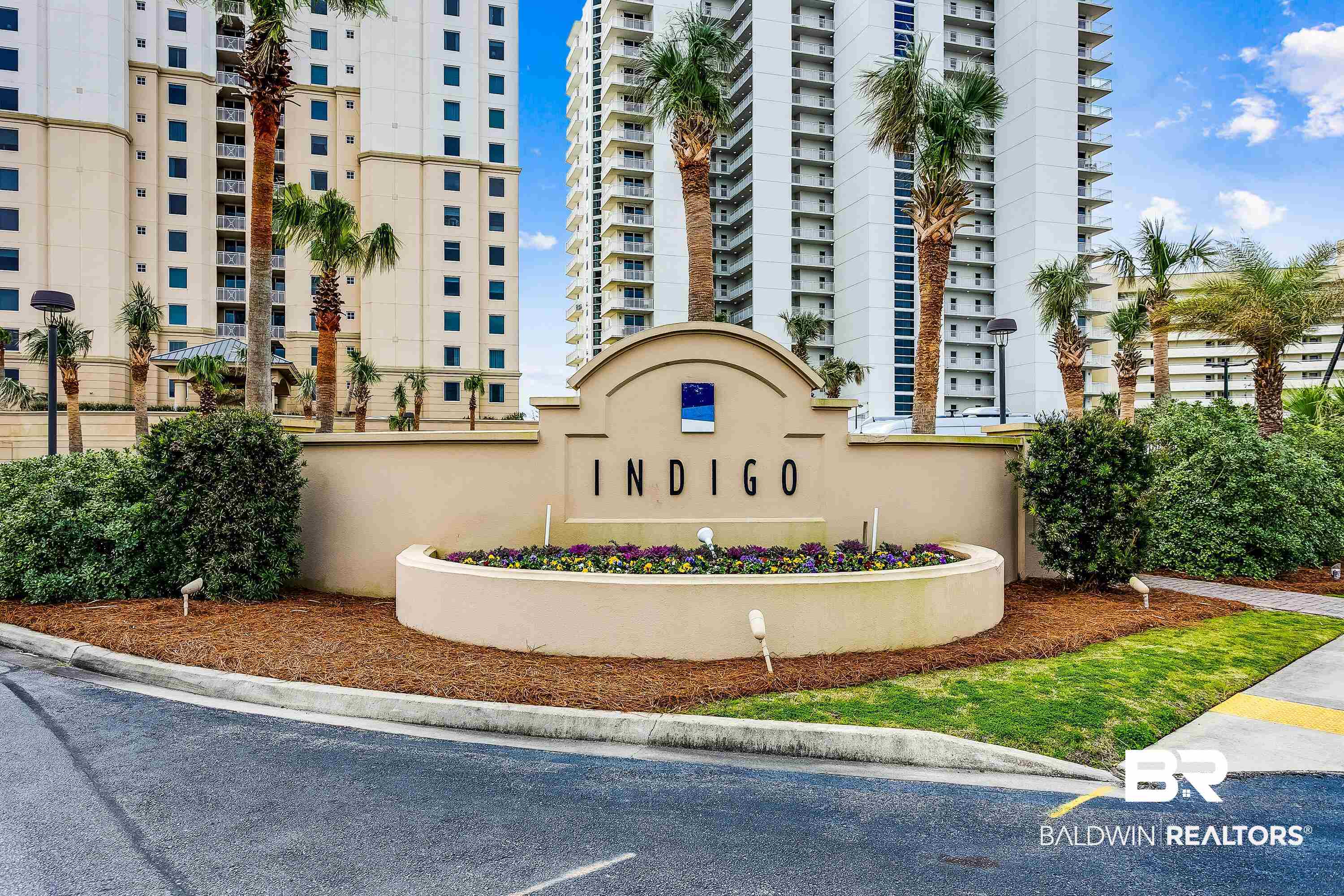 EXPERIENCE ULTIMATE BEACHFRONT LIVING IN THIS HIGHLY SOUGHT AFTER 3 BEDROOM, 19th FLOOR RESIDENCE IN THE EAST BUILDING BOASTING THE PREMIER VIEW AT INDIGO! Offered FULLY FURNISHED in beautiful coastal modern design, this turn-key residence is move-in ready and would make a great 2nd home or rental income producing property! A truly divine primary suite with sitting area, massive picture window overlooking the Gulf of Mexico, easy access to the beachfront terrace and an en-suite bath with double vanity and separate glass shower. The private guest suites share a North facing balcony with spectacular views of Perdido Key! Enjoy plenty of storage in this beach home with walk-in closets, laundry area and convenient owner storage at the amenity level. Enjoy the privacy of the Gulf-front balcony with amazing views of the emerald green waters and the white sandy beach below. Indigo's resort-style amenities include a 6,000 SF zero entry pool, gazebo, grilling areas, social room with caterer's kitchen, theater, exercise room, steam/sauna, and tennis courts. Plenty of covered garage parking, climate-controlled owner storage, and on-site management make Indigo one of the premier beachfront condos along the coast! Buyer to verify all information during due diligence.
