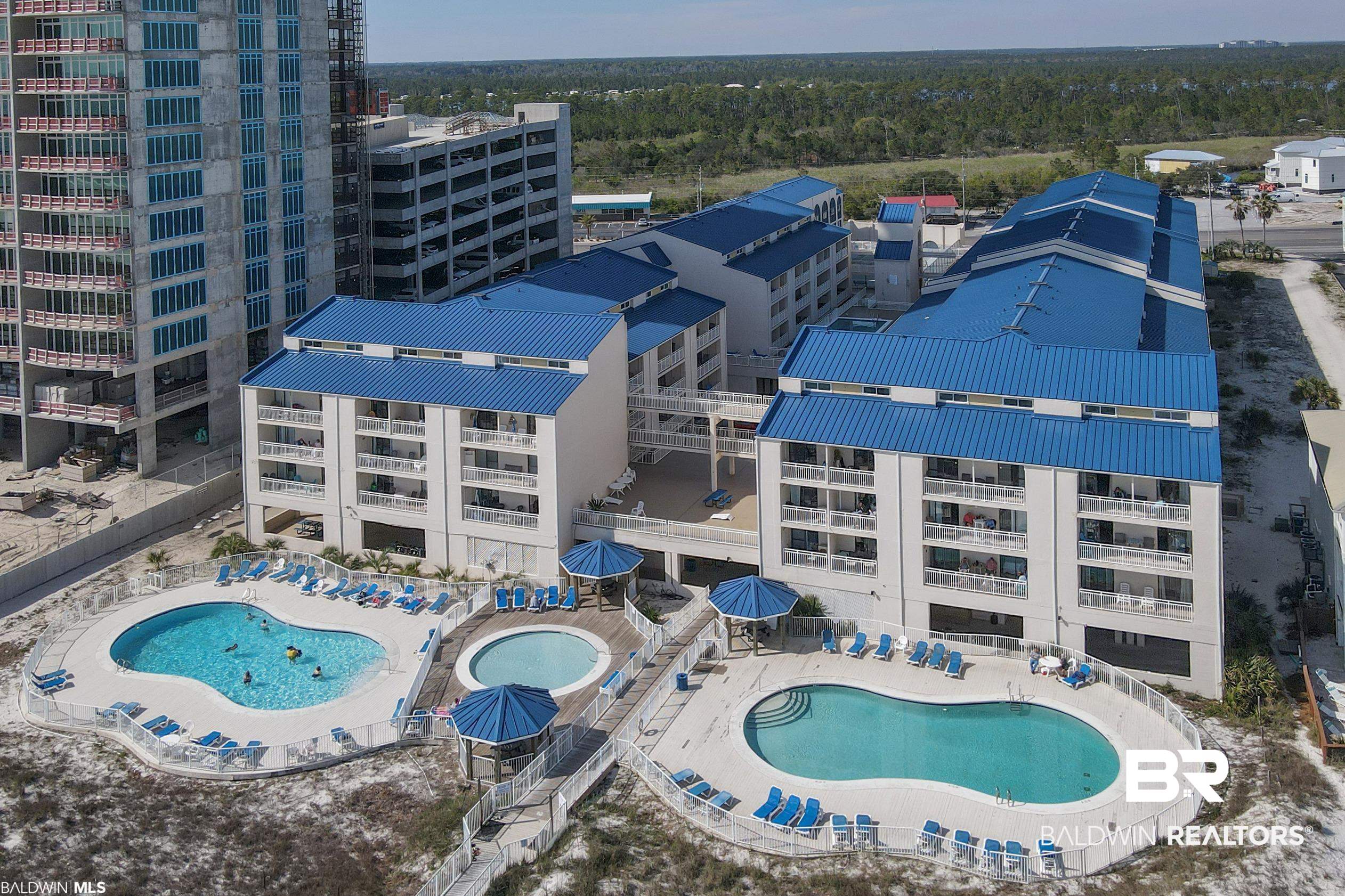 Rare opportunity to own a 3-bedroom, 2.5-bath Gulf-front condo in the highly sought-after Sugar Beach community in Orange Beach. Located directly on the white sandy beaches of the Gulf of Mexico, Unit 333 offers the ideal combination of personal enjoyment and strong rental income potential.This turn-key, fully furnished unit features a well-designed floor plan with the main living areas with vaulted ceilings  and primary suite conveniently located on the main level. The open living and dining space is comfortable and inviting, flowing seamlessly to a private balcony with beautiful Gulf views, perfect for relaxing, entertaining, or simply enjoying the coastal breeze.The galley-style kitchen is efficiently laid out and fully equipped, offering everything needed for everyday living or vacation stays. A convenient half bath is also located on the main level for guests. The spacious primary bedroom and en-suite bath provide comfort and privacy, making main-level living easy and functional. Upstairs, you’ll find two large guest bedrooms designed to maximize sleeping capacity—ideal for rental flexibility. One bedroom features multiple bunk beds, while the other offers a queen bed with additional sleeping space. These rooms share a well-designed Jack-and-Jill bathroom, providing convenience and privacy for guests or family members.Sugar Beach is known for its resort-style amenities and prime location, offering:Three outdoor pools, including one seasonally heatedDedicated kiddie poolTennis and pickleball courtsCovered parkingOn-site management and securityBBQ area and beautifully maintained groundsThe popular on-site “Sugar Shack” snack bar serving food and beveragesLocated just minutes from Gulf State Park, shopping, dining, and entertainment, this property offers both privacy and accessibility. For investors, this unit delivers proven rental income, with approx. $46,000 in 2024, $42,000 in 2025, and strong bookings in 2026. Buyer to verify all inf Buyer to verify all infor Buyer to verify all information during due diligence.