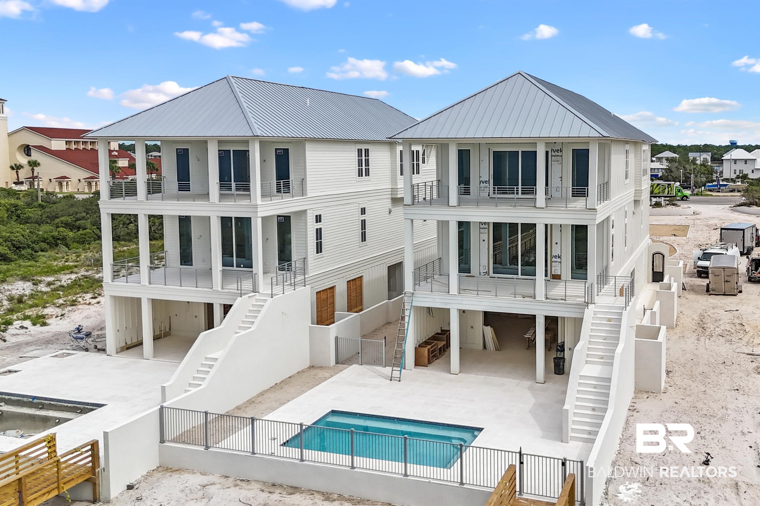 You will step into Coastal Elegance at the newest and most Upscale Development located in the heart of Orange Beach, Alabama.  South Beach OBA features Four Direct Gulf Front Homes situated on over an ACRE each.  Each home features 6 bedrooms, 7.5 baths, Huge Living and Kitchen with 2 fireplaces, 2 wetbars, private pool, private Boardwalk, Huge Entertaining area, Elevator, Double Garage, Tons of Storage, Outdoor showers and baths.  Each home is Extremely upscale and has the finest details and finishes in today's market.  These homes are built 18' above sea level and has the privacy that everyone desires!  Beautiful porcelain flooring throughout, quartz and marble, 14' Kitchen Island, Wolf & Sub zero appliances, Custom Baths with Gorgeous Tile and Marble!  Rental projections are over $400K per year.  Parking spaces for up to 14 cars per home.  Homes 3 & 4 are nearing completion and ready for new owner. The most impressive homes along the Alabama or Florida Gulf Coast!Southbeachoba.com Buyer to verify all information during due diligence.