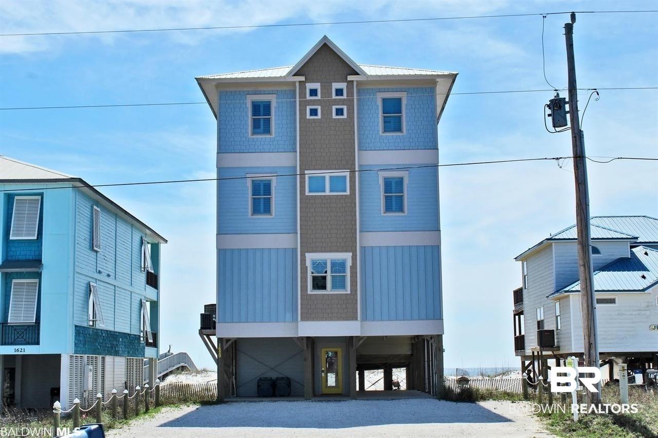 DIRECT GULF FRONT w/ private heated pool,  "Hangin 10" is a spectacular 3 story beach house. Built in 2015, this well appointed and quality construction home is a rental machine. Sleep 24 comfortably throughout the 8 bedrooms and 8.5 baths. Every bedroom has a private bath. 4 bedrooms have access to decks and beach front. One master bedroom is wheelchair accessible with 36" wide doorway and wheelchair roll in shower. Easy access with elevator. Main level dining for 20+, exquisite kitchen has quartz counters, glass tile backsplash, (2) refrigerators, (2) stoves, (2) ice makers, (2) dishwashers, (2) microwaves, (2) farm sinks and (1) prep sink in the custom center island. Cute built-in breakfast table booth. Bunk room with an arcade! Laundry on 2nd and 3rd floor that were new in 2020. HVAC condensers replaced in 2023 and 2021. Large triple decks, BBQ grill area and ample parking. New LVP in living areas and interior paint in 2022. Custom surfboard dining chandelier and various surfboard decor make the "Hangin 10" beach house truly special. One of the best locations in West Beach across from Lagoon Pass Park.  Back on the market at no fault of Seller!