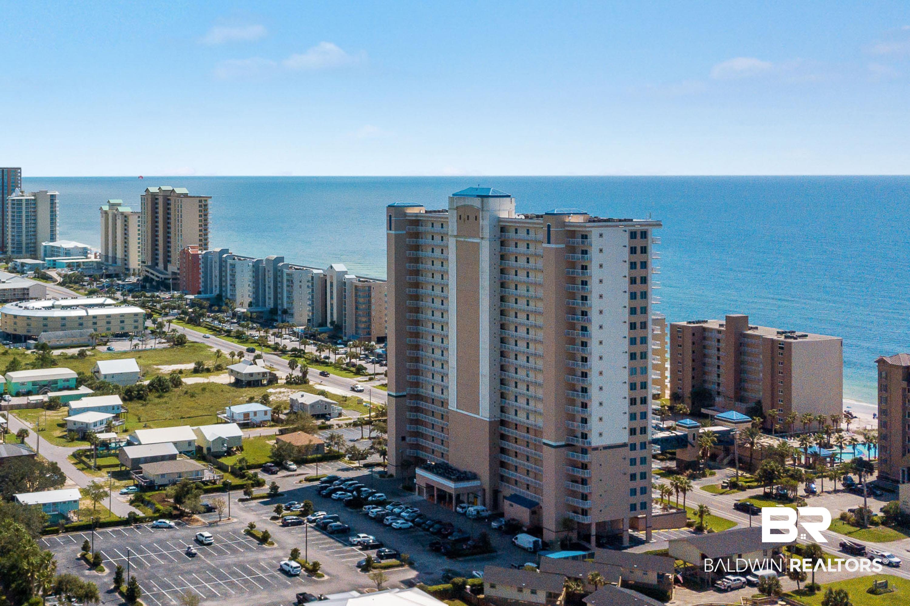 Feast your eyes on these Gulf views! Welcome to Crystal Tower, one of Gulf Shores’ most elegant and inviting condo communities on popular West Beach. With its distinctive bright blue climate-controlled skywalk, marble lobby, and modern design, Crystal Tower offers a great central location and incredible, upscale amenities including a Gulf-front pool with lazy river and hot tub, a 2nd outdoor pool and hot tub, an indoor pool, sun deck, fitness center, sauna, BBQ picnic area, and a game room for the occasional rainy beach day! Crystal Tower #908 is a spacious 2-bedroom, 2-bath condo with serene and stunning ninth-floor Gulf views from both the living area and the primary bedroom, each with access to the inviting balcony and outdoor seating to enjoy the Gulf breeze. The residence was updated in 2021 with luxury vinyl plank flooring throughout and all new balcony furniture, which includes a poly-lumber high-top cafe table with chairs and four additional side chairs with outdoor cushions. In 2022, the residence was painted in a stylish coastal palette, even the ceilings! Hallway chair rail and wainscoting were also installed, and new artwork was purchased along with new mattresses and a stainless refrigerator. In 2023, the owners updated the unit with a new dining set with chairs and bench seating, garbage disposal, and a new water heater in November. For our beach climate, the condo has a Coastal Green Air system, installed in 2020, for energy savings! Other highlights include crown molding, granite countertops, under-cabinet lighting, a queen sleeper sofa, separate utility room with full-size washer and dryer, and an owner’s closet. Unit #908 is being sold fully furnished with all appliances, electronics, decor, and items, so it’s turnkey and ready to be enjoyed as a beach getaway, second home, or rental investment! The rental history and projections are available. Includes a 1-Year Home Warranty and FREE appraisal credit up to $650 from the Local lender, Barr Group!