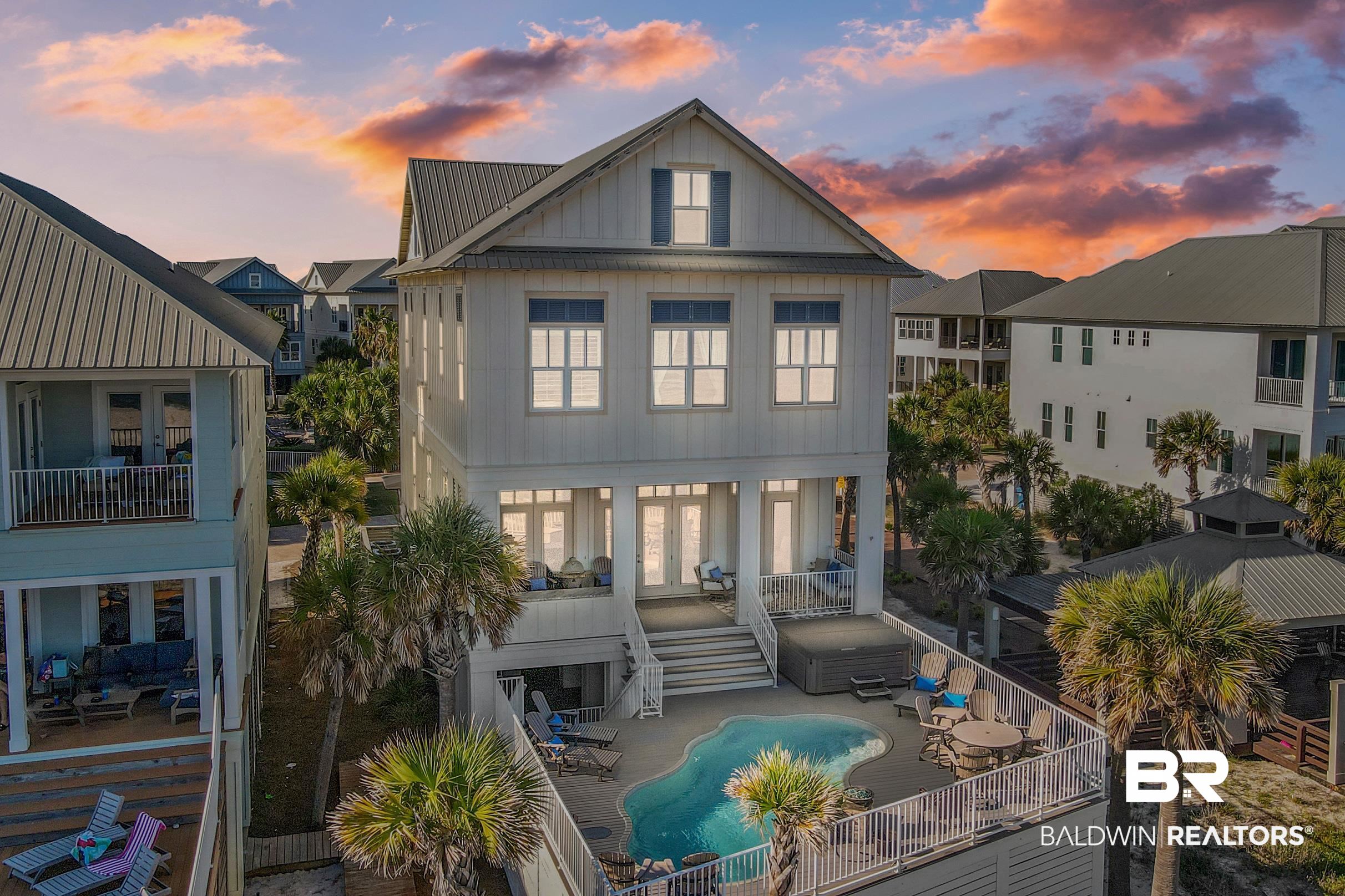 COTTAGES AT ROMAR GULF FRONT HOME! The attention to detail in this custom home with meticulous finishes throughout is ideal for 2nd home or investment. Quintessential Orange Beach lifestyle at its finest in the Cottages at Romar development with over the top amenities such as zero entry pool, gated community, fire pit, public board walk and low density subdivision. The home is complete with with a spacious expansive floor plan featuring 6 bedrooms, 6 bathrooms, 2 half baths, Fitness Room, 2 laundry rooms, Pool, Hot tub, Outdoor Kitchen, Private Beach walkway and so much more. The kitchen is an entertainers dream with custom cabinets, marble counter tops, full size refrigerator and freezer, 6 burner gas stove with griddle, double ovens, and ice maker. Each room is finished with a private bathroom finished with custom tile showers (some also have tile surround tub) and walk in closets with custom wood shelving.