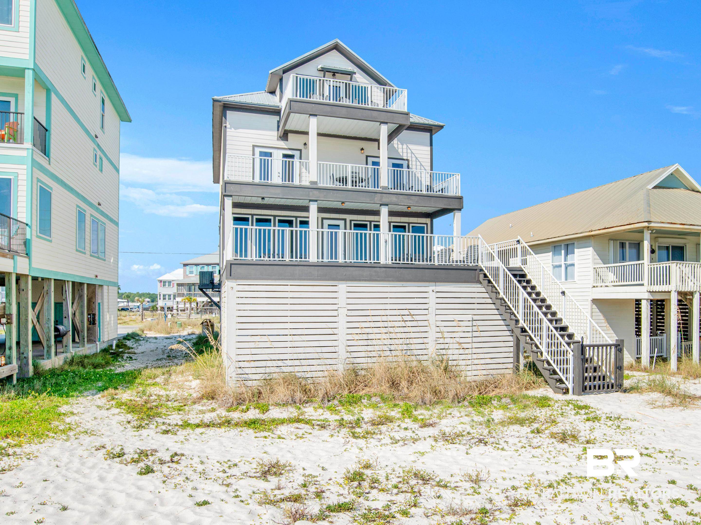Discover the epitome of coastal luxury with this stunning completely remodeled beach house nestled in the heart of Gulf Shores, AL. Boasting 7 bedrooms and 7 bathrooms across 3 spacious stories, this retreat offers ample space for up to 28 guests. Entertain effortlessly on private decks overlooking the shimmering Gulf waters, or unwind in style with exclusive access to your own stretch of pristine beach. Dive into relaxation in the private pool, or elevate your experience with the convenience of a private elevator. Whether you're seeking a serene escape or a rental machine, this Gulf Shores gem delivers unparalleled comfort and seaside charm. Buyer to verify all information during due diligence.