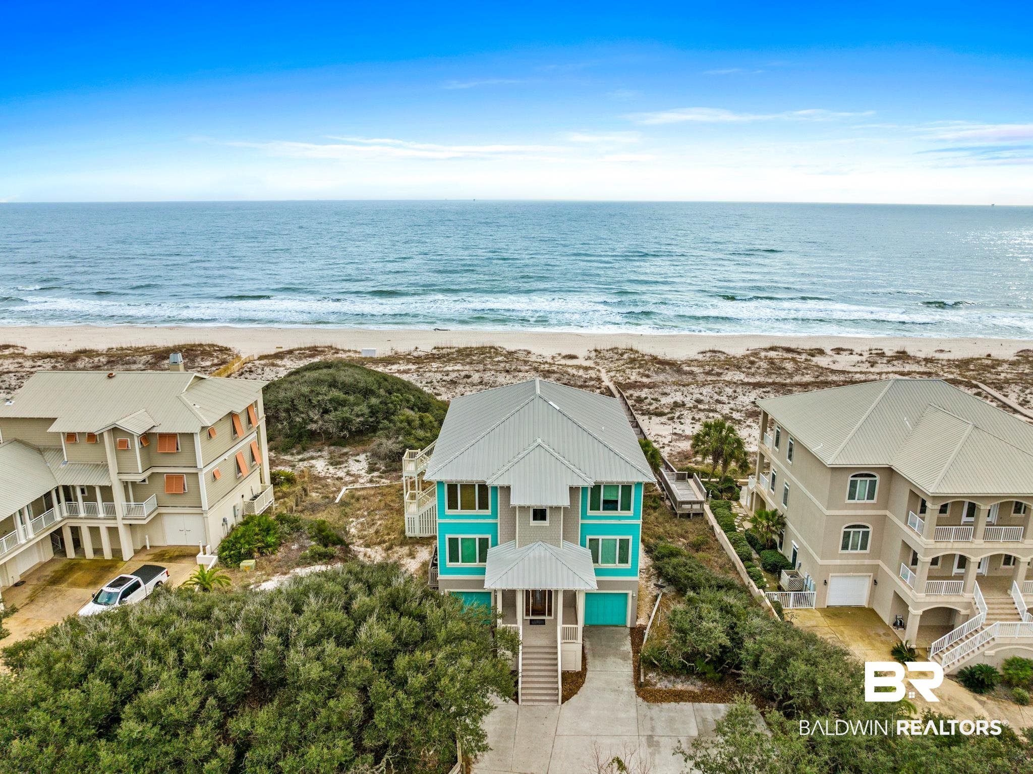 Kiva Dunes Gulf Front Home.  To say it's rare for a gulf front home to come up for sale in Kiva is an understatement.  The last home sold on the Gulf in Kiva was in August of 2014. This is easy to understand since homes on the Beach in Kiva Dunes are unlike any others in the area. This 6 bed 6 and 2 half bath with 4608 sq ft. Beach Cottage has a hundred feet directly on the Gulf and over 1.6 total acres atop a stunning dune over 20+ feet above the sea with 1st floor living area overlooking a private gulf front heated pool, this Kiva Dunes lot and home are simply works of art.  Being sold fully furnished and turn key, the only thing for new owners to do is grab the swim trunks and flip flops and begin enjoying a lifestyle unmatched anywhere on the Gulf Coast. This home features 3 master suites, 2 bunk rooms, 3 living areas plus office space, additional guest suite, 3rd floor living area with vaulted wood ceilings, large kitchen island, all stainless appliances, fireplace, dining, a 12 x 40 screened porch all overlooking the Gulf with unimaginable views, sunrises and sunsets. There's ample storage for all your beach gear in private owners closet and two carports. There's great entertaining for family and friends poolside with outside shower and nice grill.  Simply to much to list here, Schedule a showing today. Buyer to verify all information during due diligence.