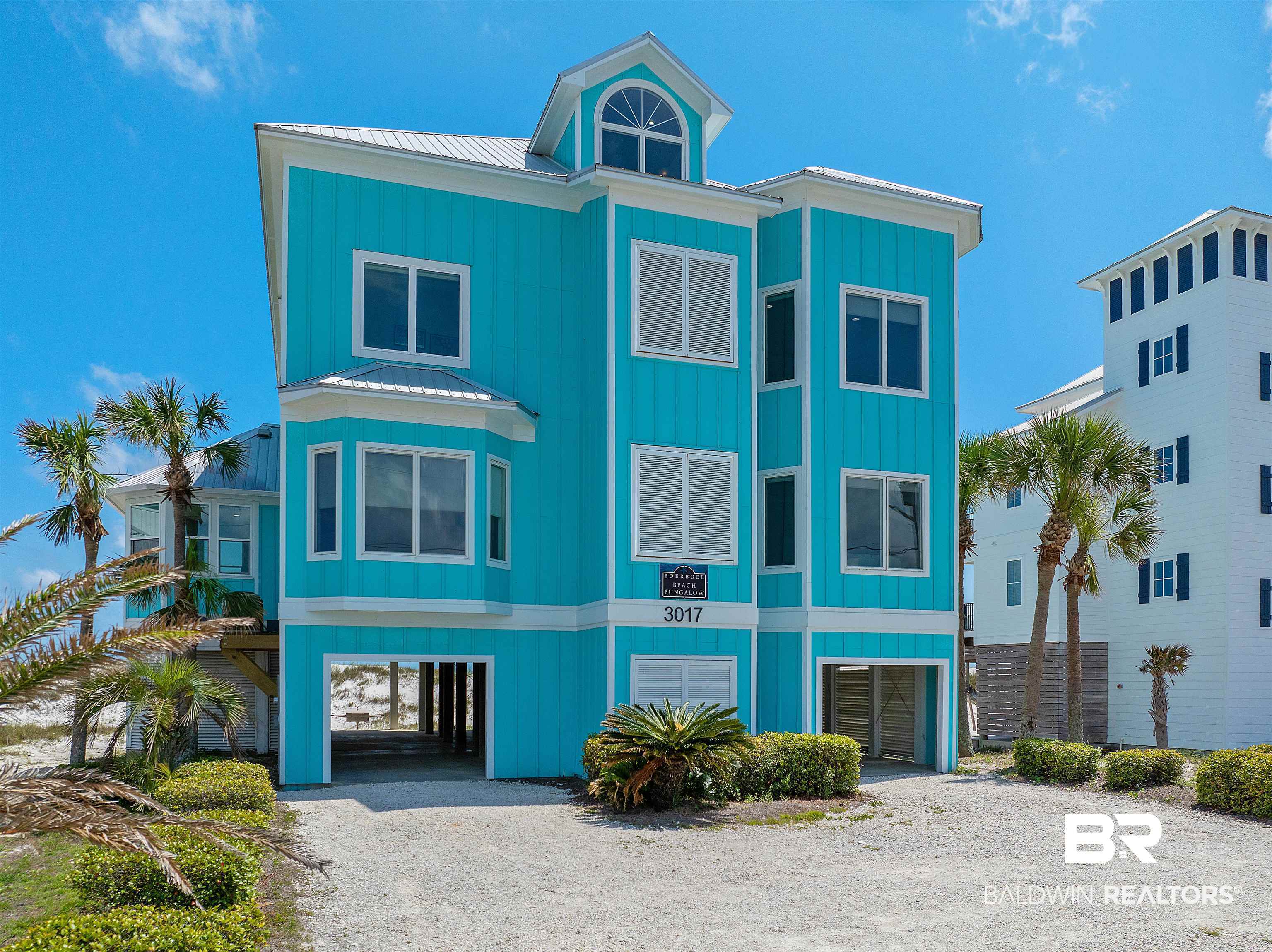 Welcome to your dream home on West Beach! This stunning property boasts 100 feet of gulf frontage and breathtaking views of the Gulf of Mexico and Little Lagoon. Featuring seven spacious bedrooms and seven and a half baths, this home offers an open floor plan with expansive windows, flooding the kitchen, dining, and living areas with natural light.The gourmet kitchen features top-of-the-line stainless steel appliances, double ovens, an icemaker, a kitchen island with a prep sink, two dishwashers, and a two-drawer cooler. Perfect for entertaining, the living area features a wet bar, wine cooler, and mini refrigerator. Every floor includes a convenient kitchenette, and each bedroom offers serene views, ensuring comfort and tranquility throughout the home.For added convenience, the home includes an elevator. Experience the best of Gulf Shores living in this exceptional gulf-front home. This is a must-see! Location is perfect. Rental Machine. Buyer to verify all information during due diligence.