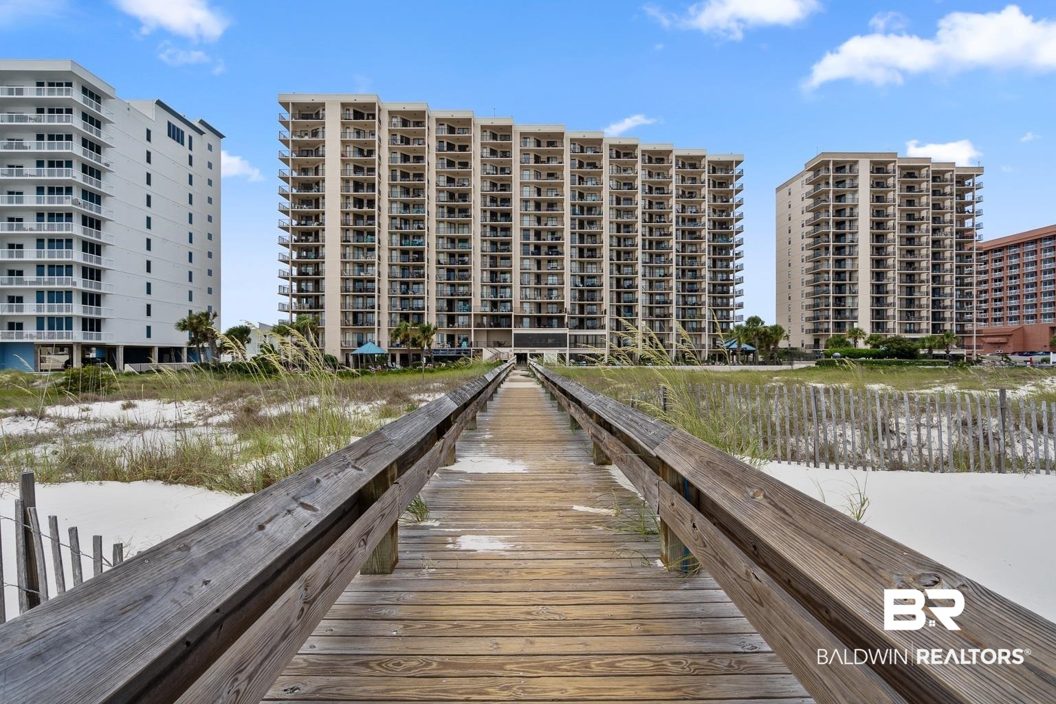 Incredible location, abundant Gulf-front amenities, and numerous updates and improvements! Phoenix East #304 is a beautifully appointed 2-bedroom, 2-bath furnished condo with over 1,000 square feet of Gulf-front living and stunning direct views of the Gulf of Mexico and Perdido Pass. Floor-to-ceiling doors and windows, plank tile flooring, elegant furnishings, and appealing coastal decor define the residence. The kitchen has updated shaker-style cabinetry with soft-close doors and redesigned functional cabinet/drawer features. Recessed lighting, granite countertops, and brushed nickel fixtures augment the plentiful kitchen storage. Other highlights include stainless GE appliances, tile backsplash, and pantry. The dining area, with chairs and bench seating for six, is a welcoming space to gather with friends. The Gulf-front primary bedroom has its own Gulf views and balcony access. The primary bath includes a sit-down vanity and a remodeled walk-in shower with a glass door, while the guest bedroom offers two full beds and a bath with shaker cabinets, granite countertops, and a tub/shower combo. Updates over the years include: new HVAC, fans/fixtures/faucets, and plank tile flooring (2018); outlets/switches, kitchen lighting, and mattresses (2019); stove (2020); primary shower, disposal, and dishwasher (2021); washer/dryer, living room furnishings (2022); window treatments, kitchen faucet, LED bulbs, and living room TV (2023). Phoenix East amenities include outdoor and indoor pools, hot tubs, sauna, splash pad, Gulf-front fitness room, grills, a racquetball court, and tennis/pickleball. Boat trailer parking and owner-preferred parking near the lobby are also provided. Note that Phoenix East SHARES amenities with the next-door building, Phoenix East II, so the recreational options are even more robust! Phoenix East #304 is quite simply the whole package, with a solid rental history and future bookings, so don’t miss this opportunity. Comes with a 1-Year Home Warranty!!