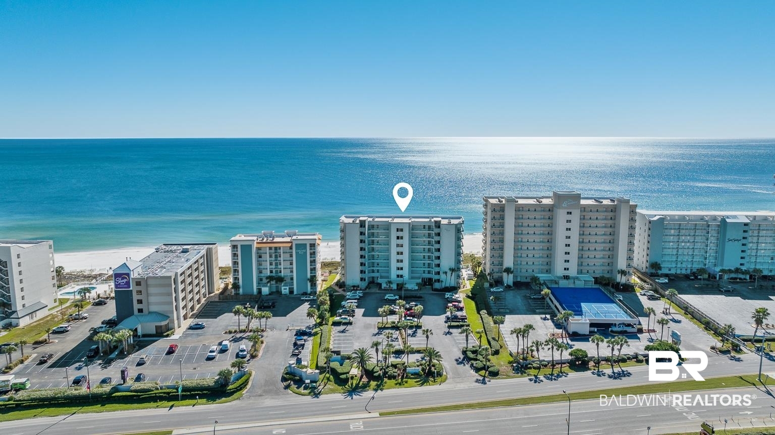 Welcome to Silver Beach #501, a showstopping east corner Gulf-front treasure in Orange Beach, Alabama. This tastefully remodeled 5th-floor residence features a grand wraparound balcony and a second balcony off the primary bedroom that provide impressive Gulf views! Renovated from top to bottom in 2022, this elegant dwelling has luxury finishes throughout, such as soft-close cabinetry, exotic granite countertops, and top-of-the-line fixtures. Nearly every detail has been thoughtfully redesigned in the past two years, from the new lighting, plumbing, and fans to the modern kitchen and sleek baths. All new sparkling high-impact doors and windows were installed in 2024, along with custom blinds in the living area. The welcoming living/dining area has been designed for comfort and to maximize those impressive Gulf views. The kitchen is ideal for entertaining, with a granite island and bar seating. The primary bedroom provides spectacular Gulf vistas, a private balcony, and an ensuite bath with an updated shower, granite vanity, new lighting, and a walk-in closet. The guest bedroom sports a king bed and balcony access with more impressive views of the Gulf, while the third bedroom has a bunk bed, full over queen, and a wall-mounted flatscreen TV. Silver Beach #501 also delivers plentiful storage, like an interior owners closet, an outdoor closet, and a utility room. Sold fully furnished and turn key! On-site amenities include a Gulf-front pool, BBQ grills, and gated access to the beach and pool area. The building got a new roof and an exterior update in 2021, and new elevators in 2024. One of the standout highlights of the Silver Beach property is that GUESTS are allowed pets here (subject to owner discretion), and this rare quality can translate into even higher rental income! Walk along beach to the best in waterfront dining and just across the street for entertainment, shops, and groceries! This is one of Orange Beach's most desirable condo communities—so act today! Bu