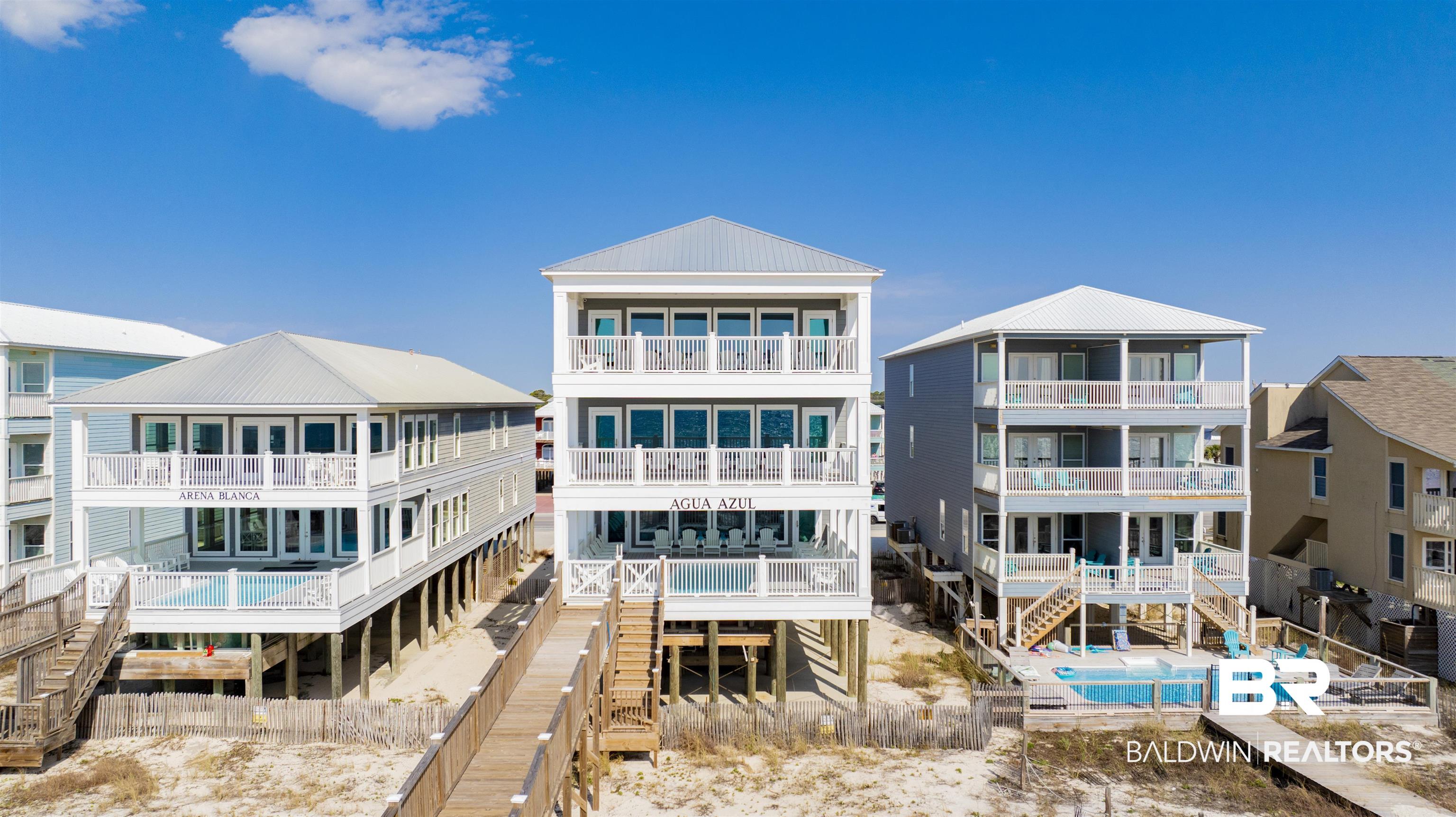 Stunning Gulf-front home in Gulf Shores, Alabama situated directly on the Gulf of America, along the coveted West Beach in Gulf Shores. This extraordinary 15-bedroom, 14-bath & 2 half baths home is designed for both entertaining & maximizing rental income. This home boasts breathtaking views of the Gulf & unparalleled amenities that will leave guests in awe. The home features a private 12x24 saltwater pool, perfect for relaxing after a day on the beach, and a beach walkover providing direct access to the pristine sand. An engineering marvel, the living area on each floor offers unobstructed, panoramic Gulf views that span an impressive 30 feet. Accessibility is a breeze with a state-of-the-art elevator featuring an automatic door, in addition to a central stairwell that services each living floor. For maximum flexibility, the home offers the rare ability to "lock out" each floor, allowing for various rental configurations - rent the top, or main floors individually, or the top/middle or main/middle or, the entire property for larger groups. The home is equipped with two full kitchens: one on the main floor and another on the top floor, each with a 100 lb/day icemaker. The main features two dishwashers, ovens, & refrigerators. There are also two laundry rooms, one on the main & the other on the top level. Outdoor living is equally impressive, with polywood furniture on every deck. The main level deck is home to the pool.  Throughout the home: 9' ceilings, elegant tile flooring, a fire sprinkler system, hurricane doors, impact glass, multiple owner closets & more. Over $400k in rentals in 2024! This home is a must see for the discerning buyer. Rental restriction by management company & may vary. Buyer to verify all information during due diligence.