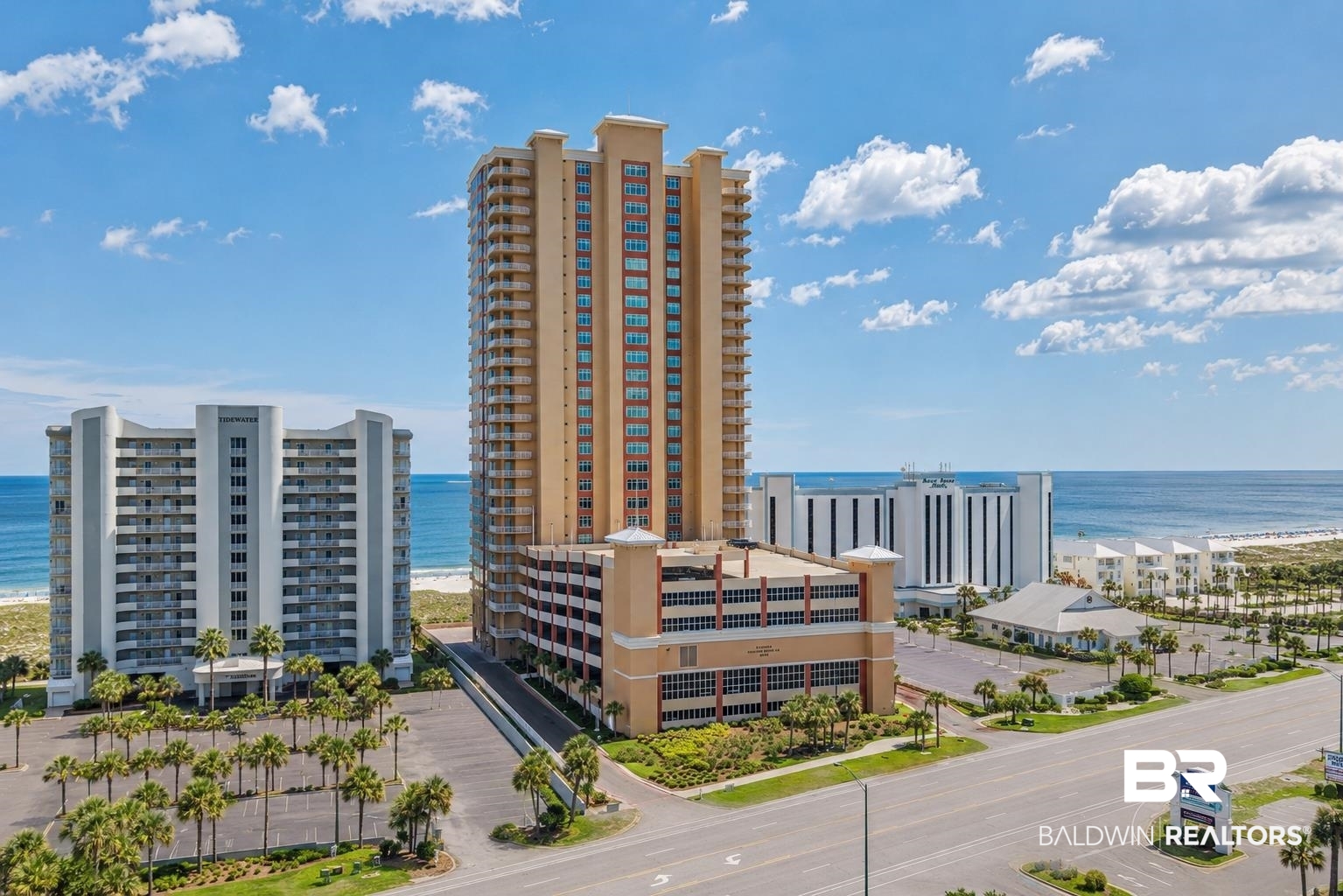 This is a Coming Soon Listing. COMING SOON... Experience incredible coastal living in this beautifully updated 4-bedroom, 3-bath east corner unit in Phoenix Orange Beach II. Enjoy panoramic views of the Gulf of America, Perdido Pass, and the islands to the north, along with stunning sunrises, colorful sunsets, and the comfort of an east-facing unit with minimal afternoon heat.Recent updates include wood look tile flooring throughout, a renovated kitchen with soft-close cabinetry, tile backsplash, an upgraded Bosch dishwasher, electronic living room shades, and a wet bar with a wine cooler. A private storage closet located directly across the hall provides convenient extra space. Phoenix Orange Beach II offers an impressive lineup of resort-style amenities, including a lazy river, kiddie splash pad, indoor and outdoor pools, and a fully equipped fitness center. This exceptional residence is a true private retreat with the added potential to be an incredible rental machine. Buyer to verify all information during due diligence.