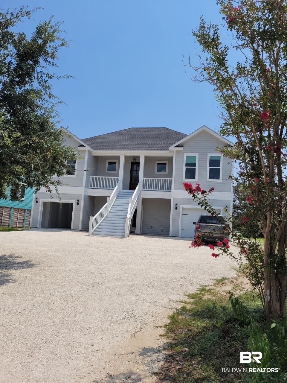 This is a Coming Soon Listing. Exceptional waterfront residence on excusive Ono Island. This Gold-Fortified island home designed by Bob Chatham Custom Home Designs and built by Avery Constructors features a main level open-concept kitchen, dining and living area filled with natural light. The primary suite has a large bathroom with double vanity, walk-in shower, garden tub and water closet. The walk-in closet has ample hanging and shelf capacity. The Main bedroom has a screened porch overlooking the waterfront. The main level also has two additional bed and bathrooms. The floors are solid white oak plank sealed and finished on site. Bathroom floors are tile. Cabinets are custom designed and built by Coastal Woodworks, Inc. The lower level contains a large family room, bedroom, bathroom and laundry room. This home has double garages completely finished with epoxy coated flooring. The exterior has three covered porches with planked V-grooved ceilings. The yard is nicely landscaped with irrigation system. The covered boathouse has a 4 Ton boatlift, deck space, shower and lighting. A very livable luxury home only on Ono Island. Buyer to verify all information during due diligence.