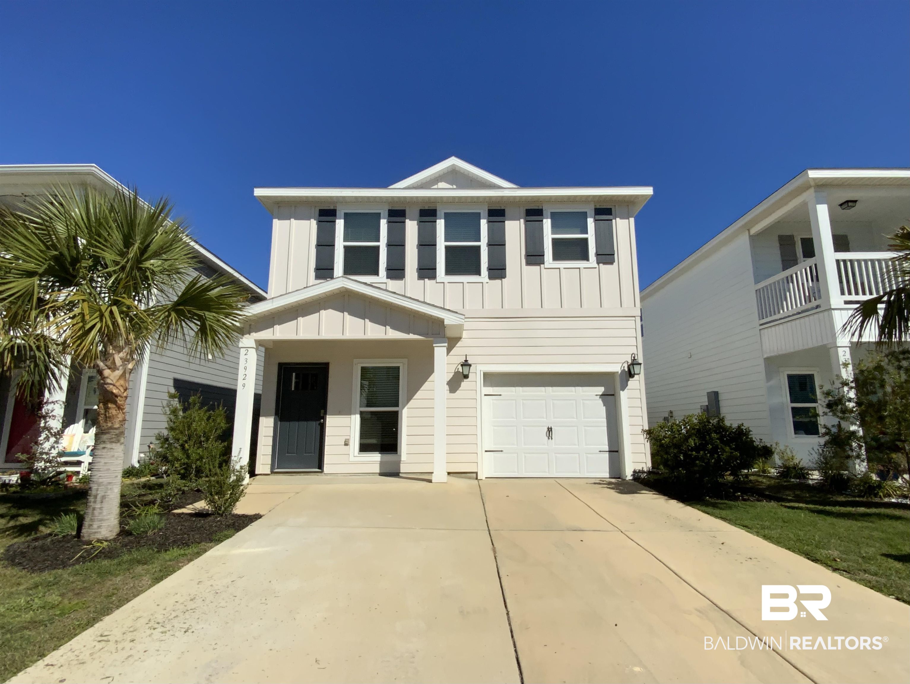 This is a Coming Soon Listing. 23929 Cottage Loop puts you right in the middle of everything people come to Orange Beach for, without feeling like you're living in the middle of the action.  This 3-bedroom, 2.5 bath home in Cypress Village has a comfortable, functional layout with plenty of room to spread out, whether you're here full-time, spending weekends at the coast, or hosting friends and family.  Inside, the three bedroom setup gives you the flexibility for guests, a home office, or whatever fits your life best, and make everyday living and entertaining a little easier.  Out back, the fenced yard gives you your own private outdoor space for pets, kids, grilling, or simply relaxing at home.  The home is Gold Fortified, an especially valuable feature to have on the Gulf Coast. You'll also have access to resort-style neighborhood amenities, including a zero-entry pool with a lazy river, grilling stations, and covered seating areas. The location is hard to beat with the Wharf's restaurants, shopping, movie theater, concerts in the amphitheater, and events practically around the corner, while Orange Beach's sugar-white beaches are only a short drive away.  If you've been looking for a home that has great amenities and a great location this home checks a lot of boxes.
