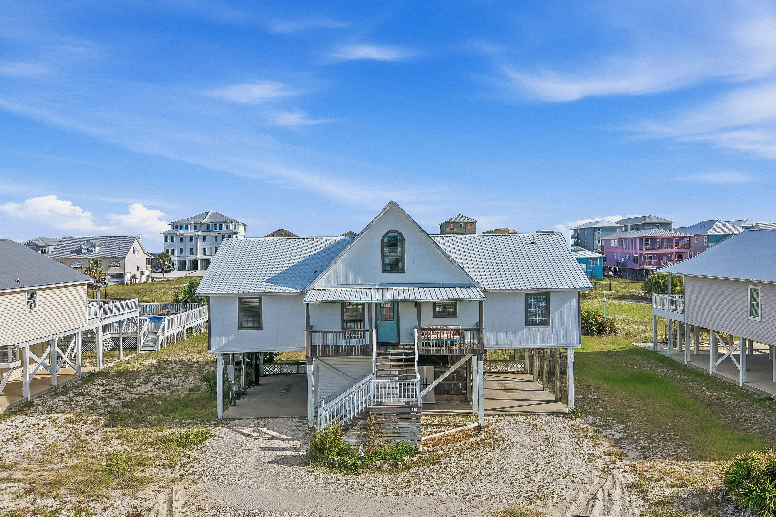 Set on a rare, oversized double lot in the heart of West Lagoon, this property offers a unique opportunity to own a beach home where location, outdoor living, and future potential take center stage. With views of both the Gulf and Little Lagoon, a private pool, and just a short stroll from the sugar-white sand and emerald waters of the Gulf, this beach home presents a rare opportunity to own a a primary residence, second home, investment property, or a combination of all three. Inside, the home features three bedrooms, two bathrooms, plus a spacious loft, with an open-concept living area designed to bring everyone together after a day on the beach. Vaulted ceilings and abundant natural light create an inviting atmosphere, while the expansive rear deck extends the living space outdoors, providing the perfect backdrop for morning coffee, sunset gatherings, or relaxing beneath the coastal sky. The fenced double lot is a standout feature and offers an exceptional amount of outdoor space, anchored by a private pool and surrounded by mature coastal landscaping. Perfectly positioned between the Gulf and Little Lagoon, owners can enjoy easy access to the beach while also taking advantage of nearby opportunities for kayaking, paddleboarding, fishing, and boating. Whether enjoyed as a personal retreat or enhanced over time, the property provides flexibility that is increasingly difficult to find this close to the beach. The location offers a unique blend of recreation, tranquility, and convenience, all within minutes of Gulf Shores' restaurants, shopping, and entertainment. Being sold furnished, the home is ready to enjoy as a personal retreat or investment property from day one. Properties with this combination of rare double lot, private pool, water views, and an exceptional West Lagoon location are increasingly hard to find, making this home a property where the true value extends well beyond the walls of the home. Buyer to verify all information during due diligence.