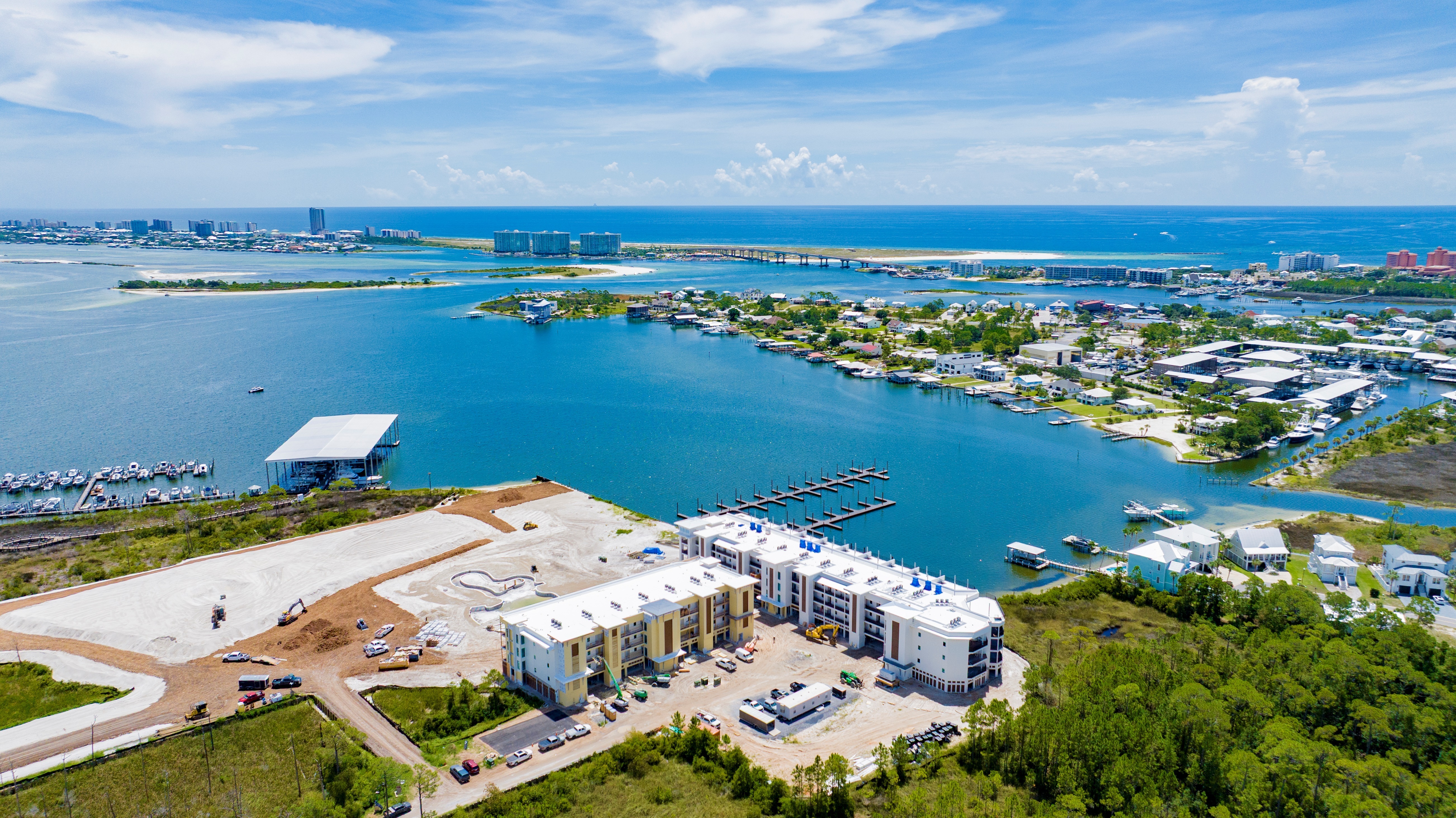 Preconstruction opportunity at Abaco Orange Beach—Penthouse 302 delivers incredible waterfront views over Terry Cove and an elevated coastal lifestyle in an exclusive 3-bedroom, 3-bath residence. This penthouse design includes 10’ ceilings, 8’ solid-core doors, and upgraded cabinetry and appliances, with interiors curated by Melanie Martin Interiors. Finishes will include quartz countertops, a gas range, engineered wood flooring, and a wet bar with icemaker, plus thoughtful details like a shiplap accent wall, enhanced sound attenuation, interior and exterior storage, and washer/dryer. The primary suite is slated to feature a tiled shower with glass door, and guest baths will include tiled surround finishes. A standout Penthouse feature: your private rooftop deck, accessed from the balcony via a spiral staircase, will be equipped with a sink, refrigerator, and cabinetry—perfect for sunset entertaining above the cove. Abaco Orange Beach will be  gated, the development will offer 23± acres with approximately 840± feet on Terry Cove, featuring a state-of-the-art marina—and Penthouse 302 includes Boat Slip #15. Resort-style amenities will include a pool with lazy river, kids’ area, hot tub, Hope Town Green greenspace, boardwalk, fitness center with sauna, pickleball courts, fire pits, ice machines, covered parking, and EV charging. Disclosure: Seller holds an equitable interest. Property is under construction — “Need Not Be Built – Details Subject to Change.” Association dues are estimated, and insurance is planned to be assessed annually separate from COA dues/fees. Completion is anticipated late summer 2026. Abaco Orange Beach will require a 3-night minimum rental. Listing Broker is a member of selling entity. This is an equitable interest listing where seller is selling only an option contract or assigning an interest in a contract, such as a purchase and sale agreement or a contract for deed. In this situation, th This is an equitable interest listing where seller is selling only an option contract or assigning an interest in a contract, such as a purchase and sale agreement or a contract for deed. In this situation, the seller does not have legal title to the property, but the equitable interest gives seller the right to acquire legal title.