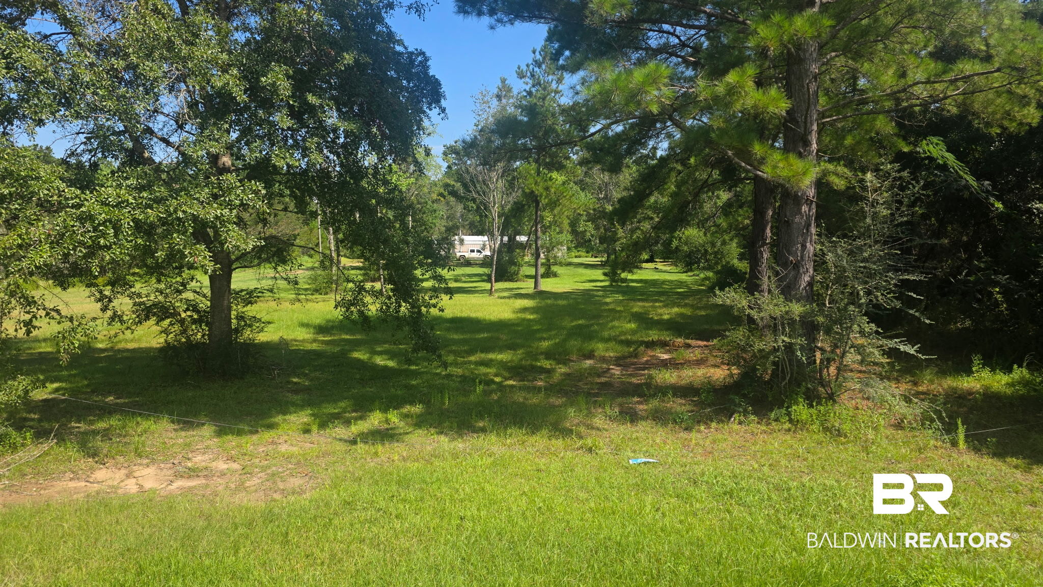 Photo 2 of Land for sale at 22003 County Rd 68 N, Robertsdale, AL 36567 | MLS# 409296 | Listing updated on 2026-09-20