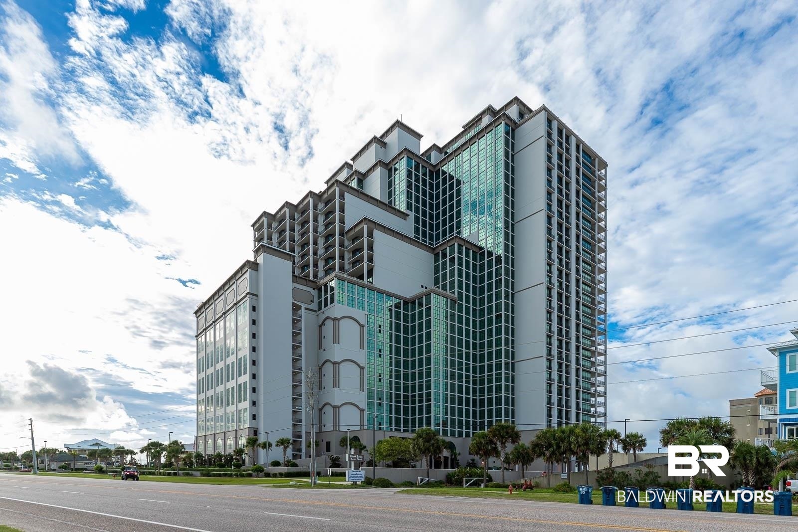 North-facing 3BR/4BA residence at The Oasis at Orange Beach (formerly Phoenix West II) offering expansive views of the Gulf of Mexico and Gulf State Park through floor-to-ceiling windows. This spacious, open-concept condo features a large living area, well-appointed kitchen, and a private balcony ideal for enjoying sunrise and sunset views. Owners enjoy resort-style amenities including multiple pools, lazy river, waterslide, indoor pool, fitness center, tennis/pickleball courts, beachfront café, and direct beach access. Ideally located on Perdido Beach Blvd near dining, shopping, and outdoor recreation. Buyer to verify all information during due diligence.