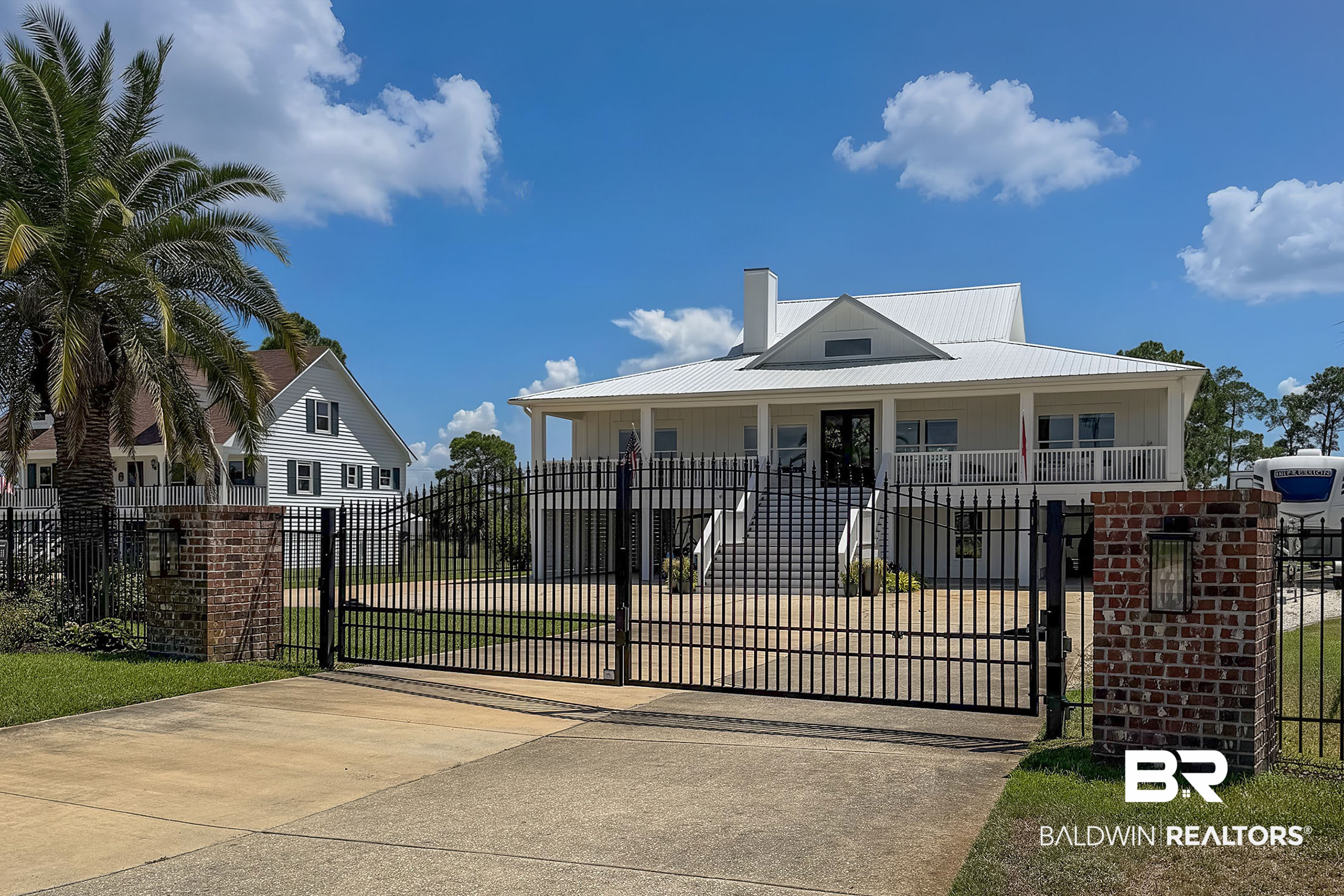 This is a Coming Soon Listing. Rarely does a property in Orange Beach offer this combination of a completely renovated home, half-acre gated lot, private pool, exceptional boat/RV parking, and a substantial workshop. Located in the exclusive Cove Drive area, this 3-bedroom, 2-full-bath, 2-half-bath residence offers approximately 2,245 square feet with indirect water views toward Terry Cove Harbour and Perdido Pass. Inside, custom cabinetry and elevated finishes are found throughout. The kitchen features quartzite countertops, abundant cabinetry, and stainless appliances, while the adjoining butler’s pantry offers additional storage, workspace, and a second dishwasher. A stylish wet bar with quartzite countertops, ice maker, and beverage refrigerator creates the perfect space for entertaining. The two guest bedrooms share a convenient Jack-and-Jill bathroom, while the additional half baths provide added functionality for family and guests. Outside, the fully fenced and gated half-acre property provides an exceptional amount of space and privacy. There is ample parking for a boat and/or RV, along with an RV electrical hookup. The huge first-level shop offers abundant room for storage, hobbies, recreational equipment, or a workshop. Enjoy the coastal lifestyle from your private in-ground pool or take advantage of the nearby boating access and waterfront amenities. Additional upgrades include impact windows, a tankless water heater and whole-home water filtration system. Ideally located near Orange Beach’s dining, shopping, entertainment, and boating, this property offers a rare blend of privacy, space, convenience, and coastal living in one of Orange Beach’s desirable residential areas. Seller is a Licensed Alabama Real Estate Agent.