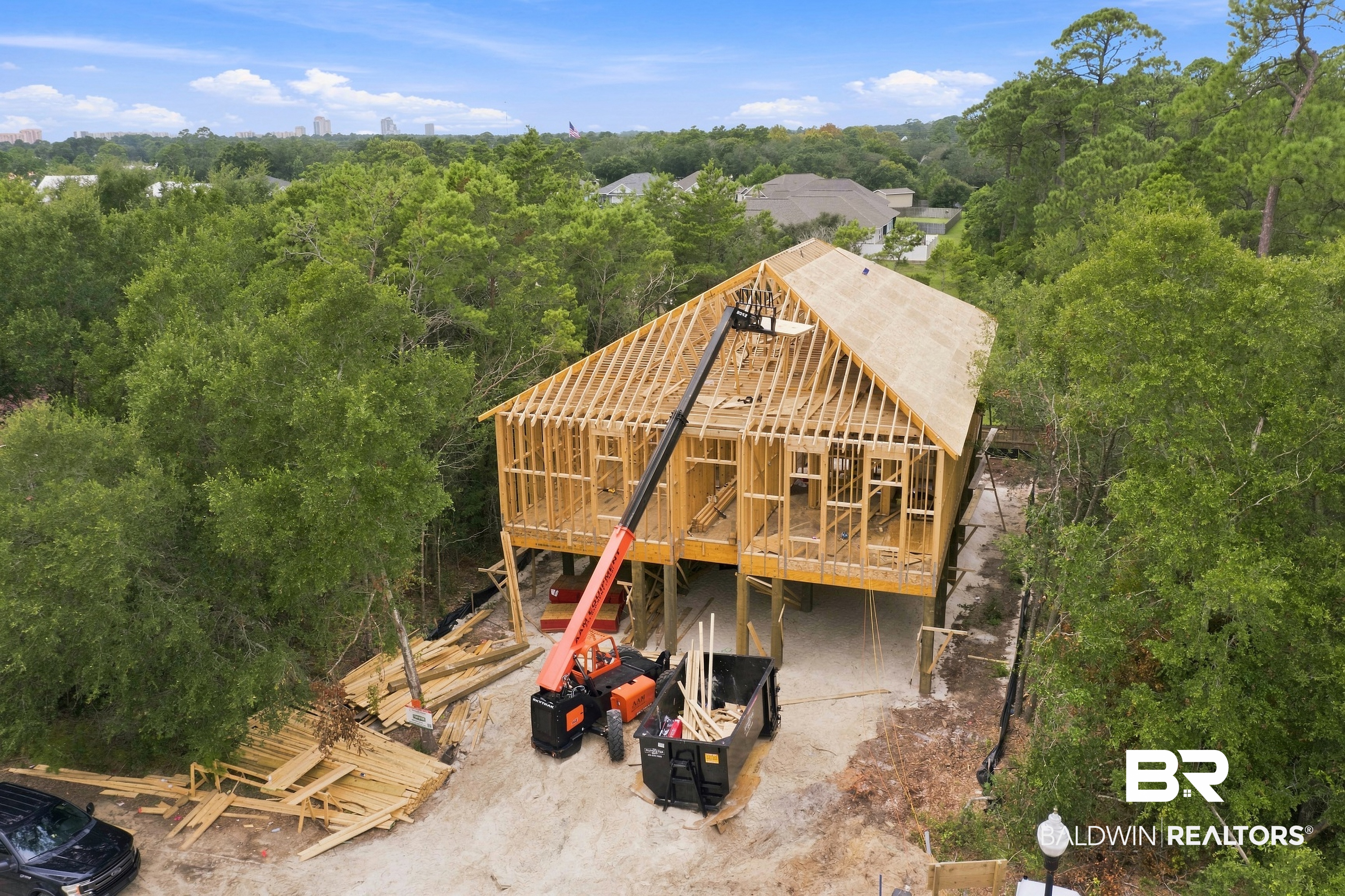 This is a Coming Soon Listing. New construction by CG Construction in Terry Cove Harbor, this 5 bedroom, 4.5 bath home is built to FORTIFIED Gold standards in no flood zone, offering 3,724 sq ft of heated living space and 6,279 sq ft total under roof. The ground level features an entry area with a bonus flex space, 2 bedrooms, a full bath, and additional outdoor storage. The main level features 12 foot ceilings, the primary suite, laundry room, a secondary primary suite with a double vanity, an additional bed and bathroom, a hallway half bath, detailed ceiling treatments, and an existing elevator shaft.The kitchen includes ZLINE appliances, a 48 inch gas range, a 10.5 foot waterfall island, and butler's pantry. The covered back porch is accessible from both the family room and the primary suite via sliding doors, with his and hers walk in closets and a wet shower and tub in the primary suite. Selections are still being finalized at this time, so depending on timing, a buyer may have the opportunity to weigh in on select finishes. Estimated completion: February 2027.