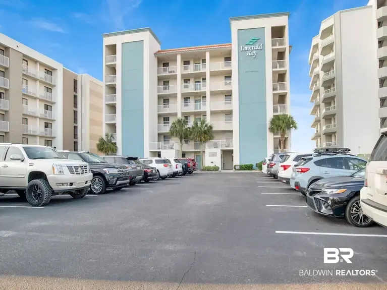 Rare Gulf-Front Corner Unit in Low-Density Orange Beach Gem!Indulge in coastal living with this fully renovated 3-bedroom, 2-bathroom corner unit at Emerald Key. This "beachy chic" retreat offers an exclusive experience with only 18 units in the entire complex!  The interior has been meticulously updated, featuring LVP flooring, stylish updated furnishings, and a kitchen equipped with stainless steel appliances, granite countertops, and a stunning custom tile backsplash. Both bathrooms boast modern tiled showers and elegant granite vanities. Both indoor and outdoor hvac updated in 2021. Refrigerator less than a year old! Being a corner unit, you are treated to fantastic, unobstructed panoramic views to the east towards the pass, viewable from the living room, bedrooms, and the expansive wrap-around balcony. This unit also includes a convenient large storage room. Emerald Key features a gated entrance, gulf-side pool, private beach, and is walking distance to the popular CoastAL restaurant and local shopping. With low HOA dues and impressive rental history (2024: 69k starting rents in April, 2025: 73k, and 2026 to date so far without fall rentals: 61k), this rare, well-maintained find is a must-see for savvy investors and second-home buyers alike. Buyer to verify all information during due diligence.