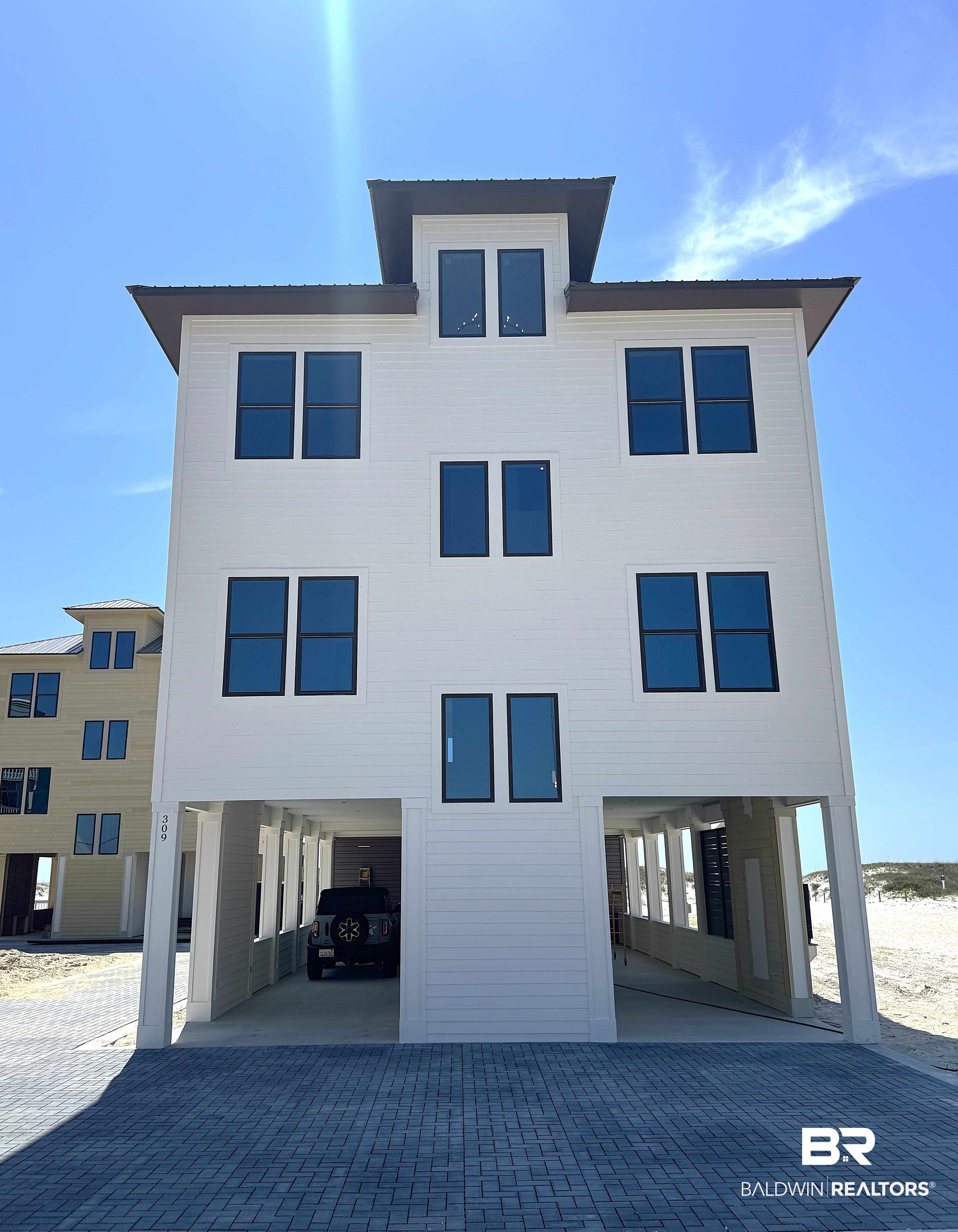 Photo 1 of Single family home for sale at 309 E Beach Blvd, Gulf Shores, AL 36542 | MLS# 394395 | Listing updated on 2026-09-24